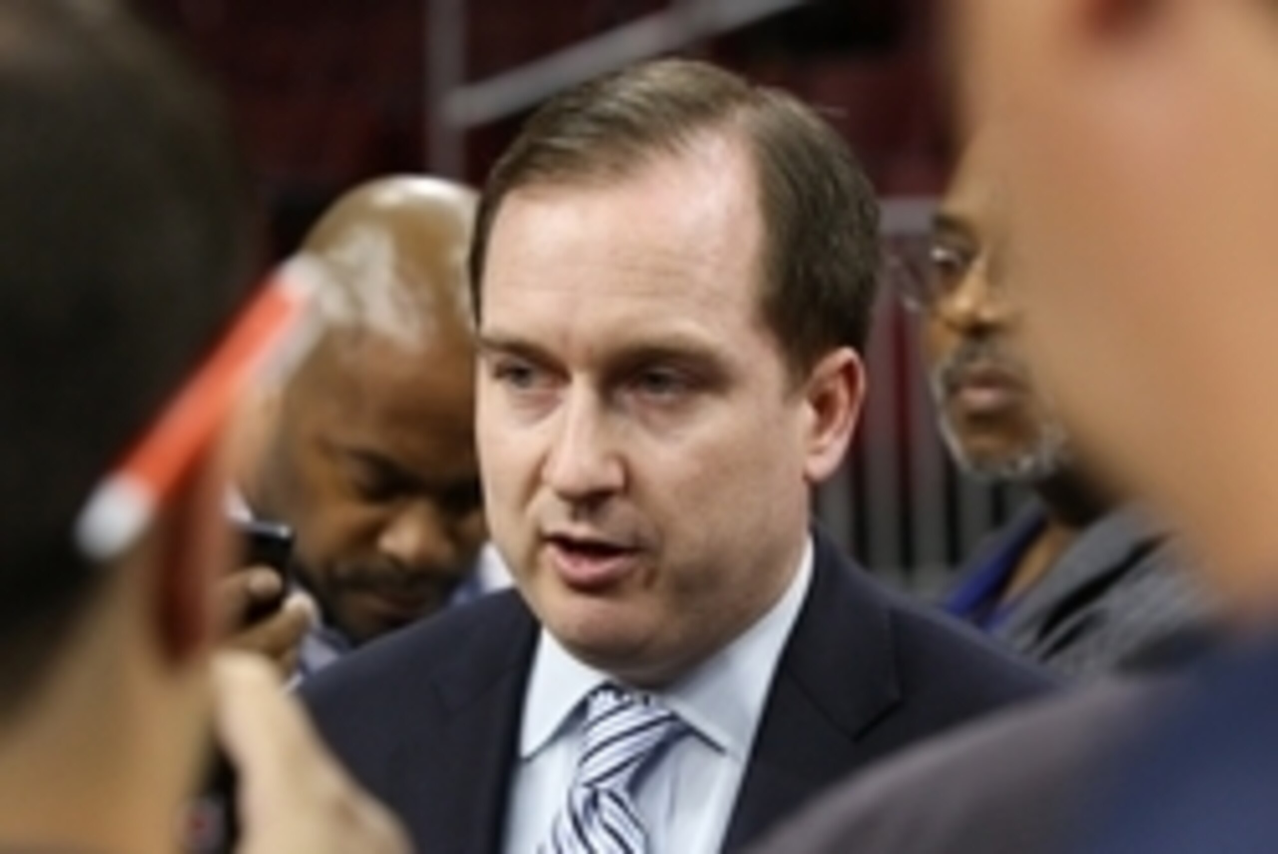 Sep 29, 2014; Philadelphia, PA, USA; Philadelphia 76ers general manager Sam Hinkie talks with reporters during media day at the Wells Fargo Center. Mandatory Credit: Bill Streicher-USA TODAY Sports