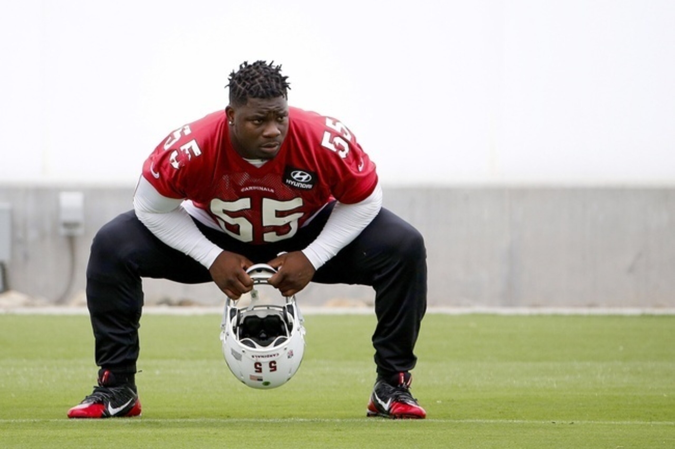 Sean Weatherspoon stretching in Cardinals camp. Sean Weatherspoon stretching in Cardinals camp.