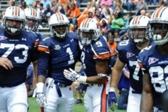 Apr 18, 2015; Auburn, AL, USA; Auburn Tigers running back Roc Thomas (9) celebrates after a touchdown during the spring game at Jordan-Hare Stadium. Mandatory Credit: Shanna Lockwood-USA TODAY Sports
