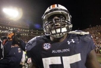 Nov 30, 2013; Auburn, AL, USA; Auburn Tigers defensive end Carl Lawson (55) reacts after defeating the Alabama Crimson Tide during the fourth quarter at Jordan Hare Stadium. Auburn Tigers won 34-28. Mandatory Credit: John Reed-USA TODAY Sports