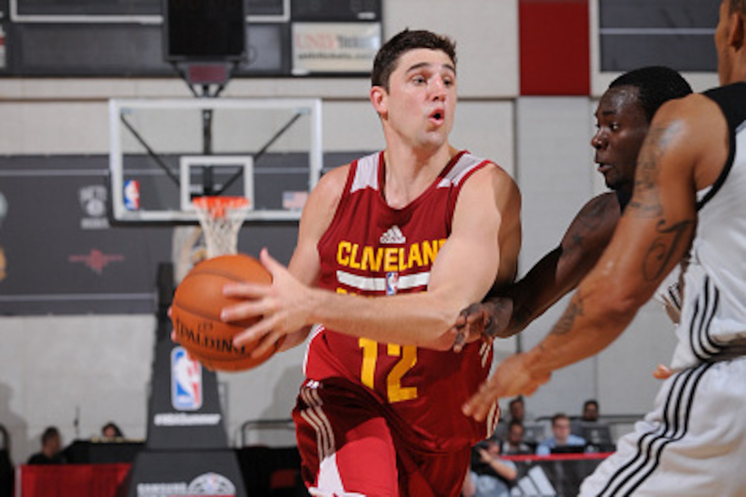 LAS VEGAS, NV - JULY 13: Joe Harris #12 of the Cleveland Cavaliers drives against the Milwaukee Bucks on July 13, 2015 at The Cox Pavilion in Las Vegas, Nevada. NOTE TO USER: User expressly acknowledges and agrees that, by downloading and or using this ph LAS VEGAS, NV - JULY 13: Joe Harris #12 of the Cleveland Cavaliers drives against the Milwaukee Bucks on July 13, 2015 at The Cox Pavilion in Las Vegas, Nevada. NOTE TO USER: User expressly acknowledges and agrees that, by downloading and or using this ph