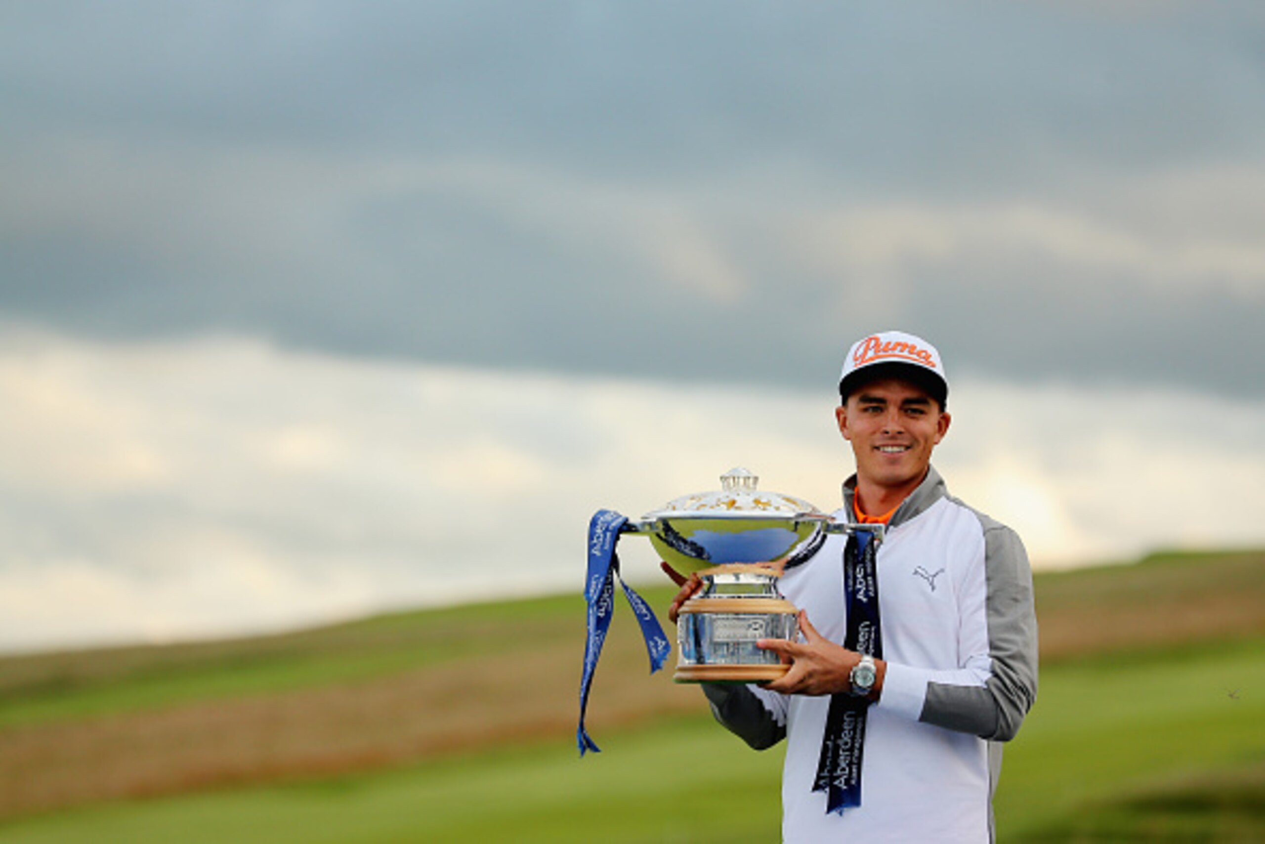 GULLANE, SCOTLAND - JULY 12:  Rickie Fowler of the United States celebrates with the trophy during the trophy presentation after winning the Aberdeen Asset Management Scottish Open at Gullane Golf Club on July 12, 2015 in Gullane, East Lothian, Scotland. 