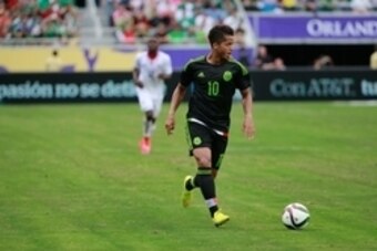 Jun 27, 2015; Orlando, FL, USA; Mexico forward Giovani dos Santos (10) dribbles the ball against the Costa Rica during the second half at Orlando Citrus Bowl. Costa Rica and Mexico tied 2-2. Mandatory Credit: Kim Klement-USA TODAY Sports