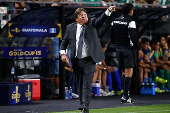 GLENDALE, AZ - JULY 12:  Head coach Miguel Herrera of Mexico reacts on the sidelines during the 2015 CONCACAF Gold Cup group C match against Guatemala at University of Phoenix Stadium on July 12, 2015 in Glendale, Arizona.  Guatemala and Mexico finished i