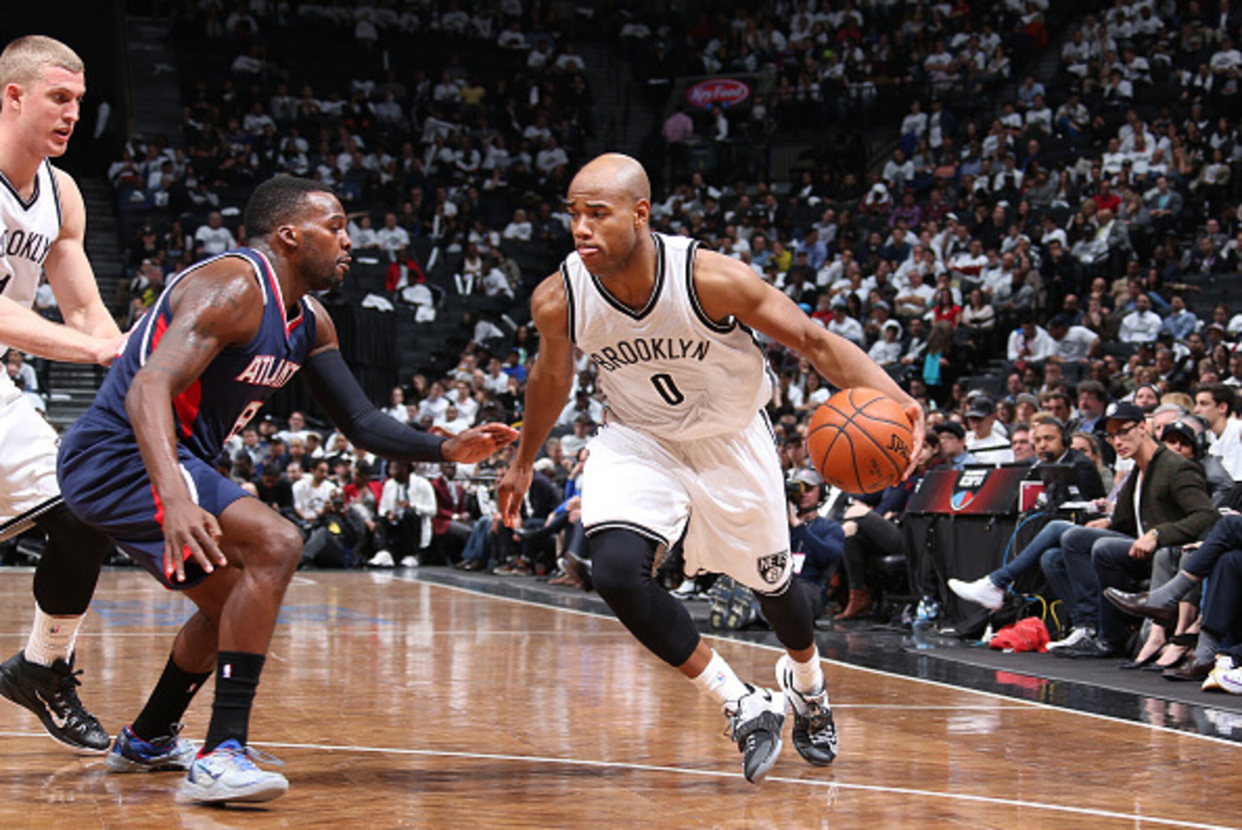 BROOKLYN, NY - MAY 1:  Jarrett Jack #0 of the Brooklyn Nets handles the ball against Shelvin Mack #8 of the Atlanta Hawks in Game Six of the Eastern Conference Quarterfinals during the 2015 NBA Playoffs on May 1, 2015 at Barclays Center in Brooklyn, New Y