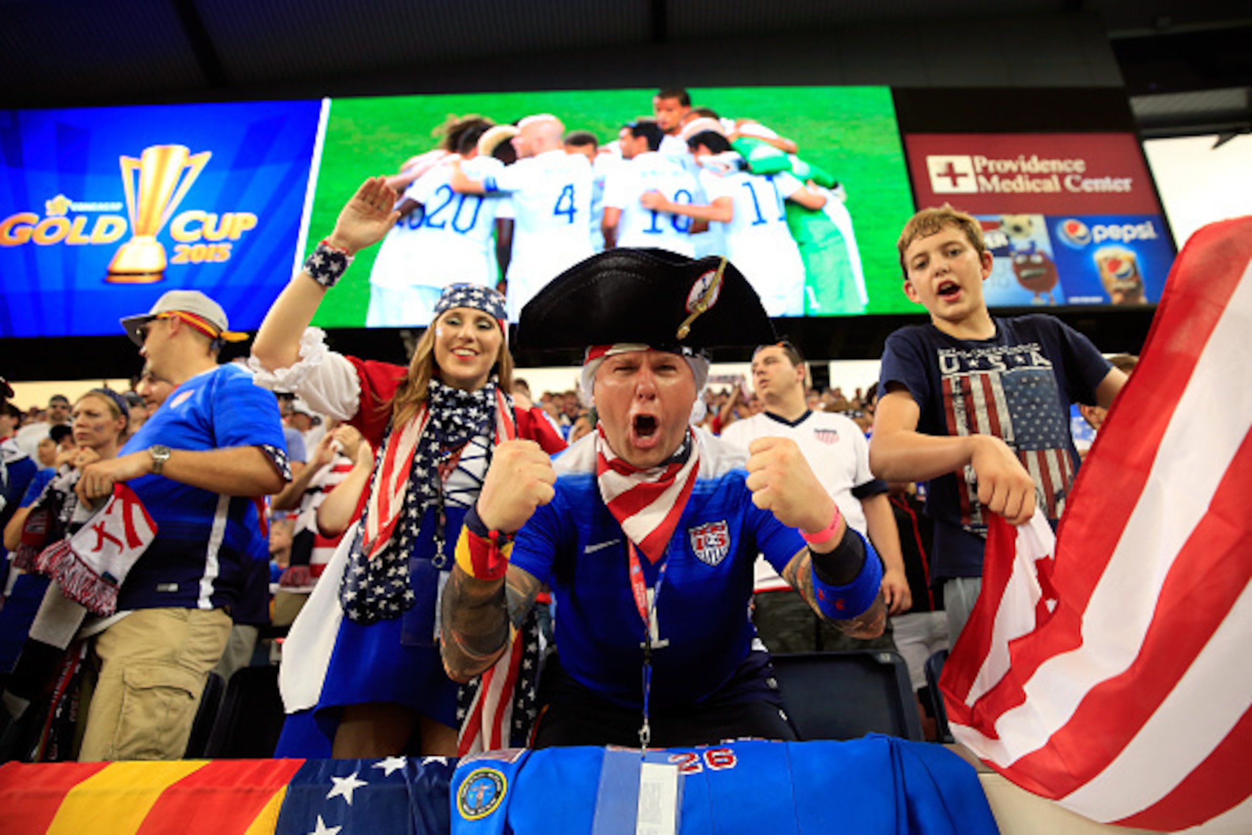 KANSAS CITY, KS - JULY 13:  USA fans cheer during the CONCACAF Gold Cup match between Panama and the United States at Sporting Park on July 13, 2015 in Kansas City, Kansas.  (Photo by Jamie Squire/Getty Images)