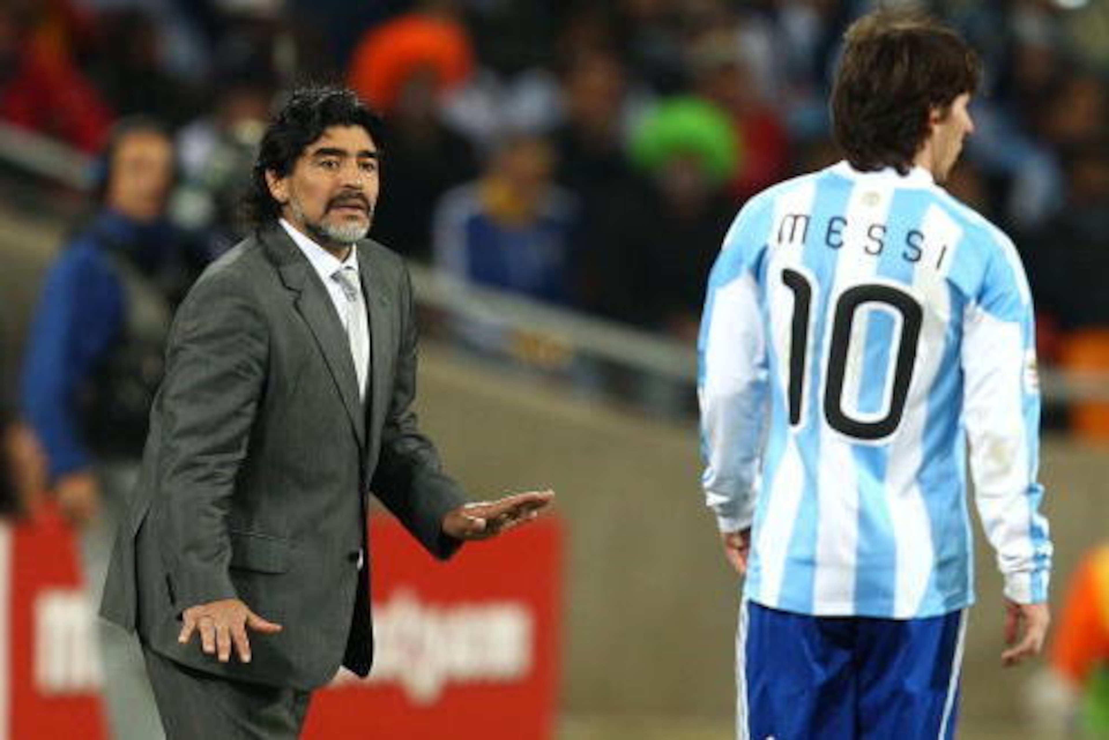 JOHANNESBURG, SOUTH AFRICA - JUNE 27:  Diego Maradona head coach of Argentina gestures to Lionel Messi of Argentina during the 2010 FIFA World Cup South Africa Round of Sixteen match between Argentina and Mexico at Soccer City Stadium on June 27, 2010 in 
