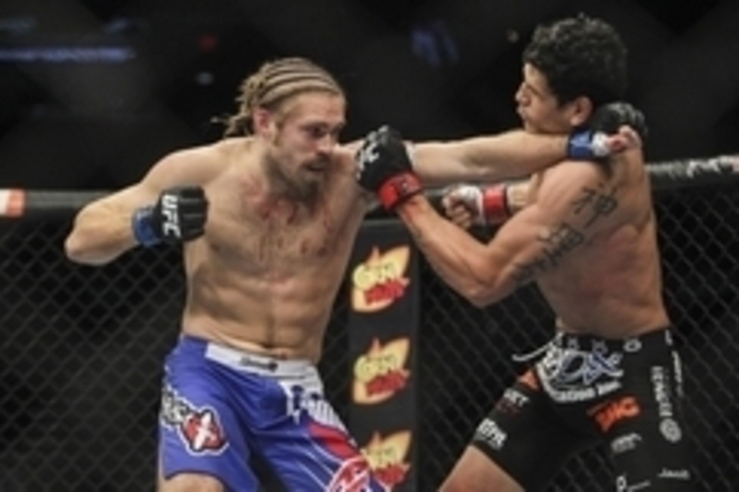 Jun 28, 2014; San Antonio, TX, USA; Cezar Ferreira (red gloves) fights Andrew Craig (blue gloves) in a Middleweight bout at UFC Fight Night 43 at AT&T Center. Mandatory Credit: Troy Taormina-USA TODAY Sports