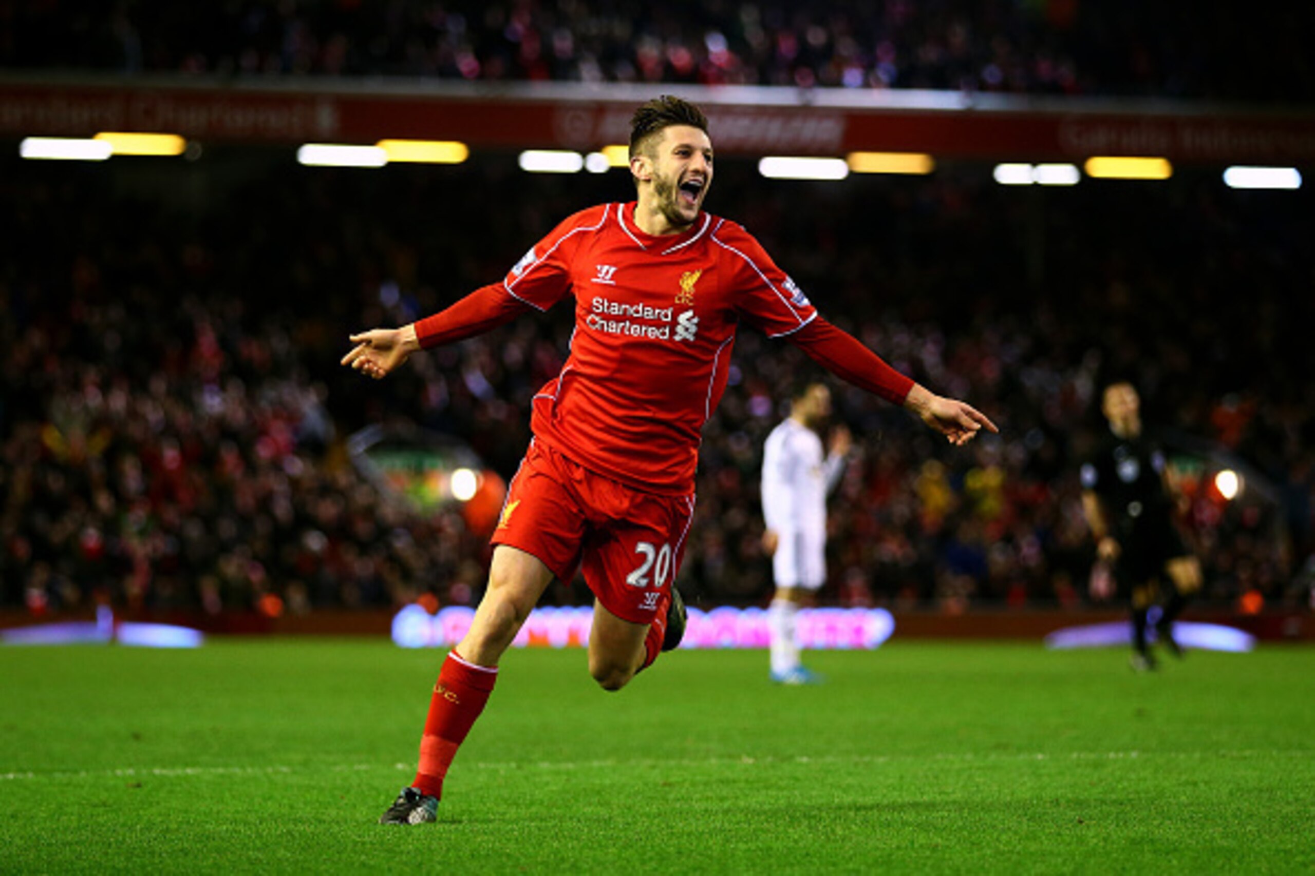 LIVERPOOL, ENGLAND - DECEMBER 29:  Adam Lallana of Liverpool celebrates after scoring his team's second goal during the Barclays Premier League match between Liverpool and Swansea City at Anfield on December 29, 2014 in Liverpool, England.  (Photo by Cliv