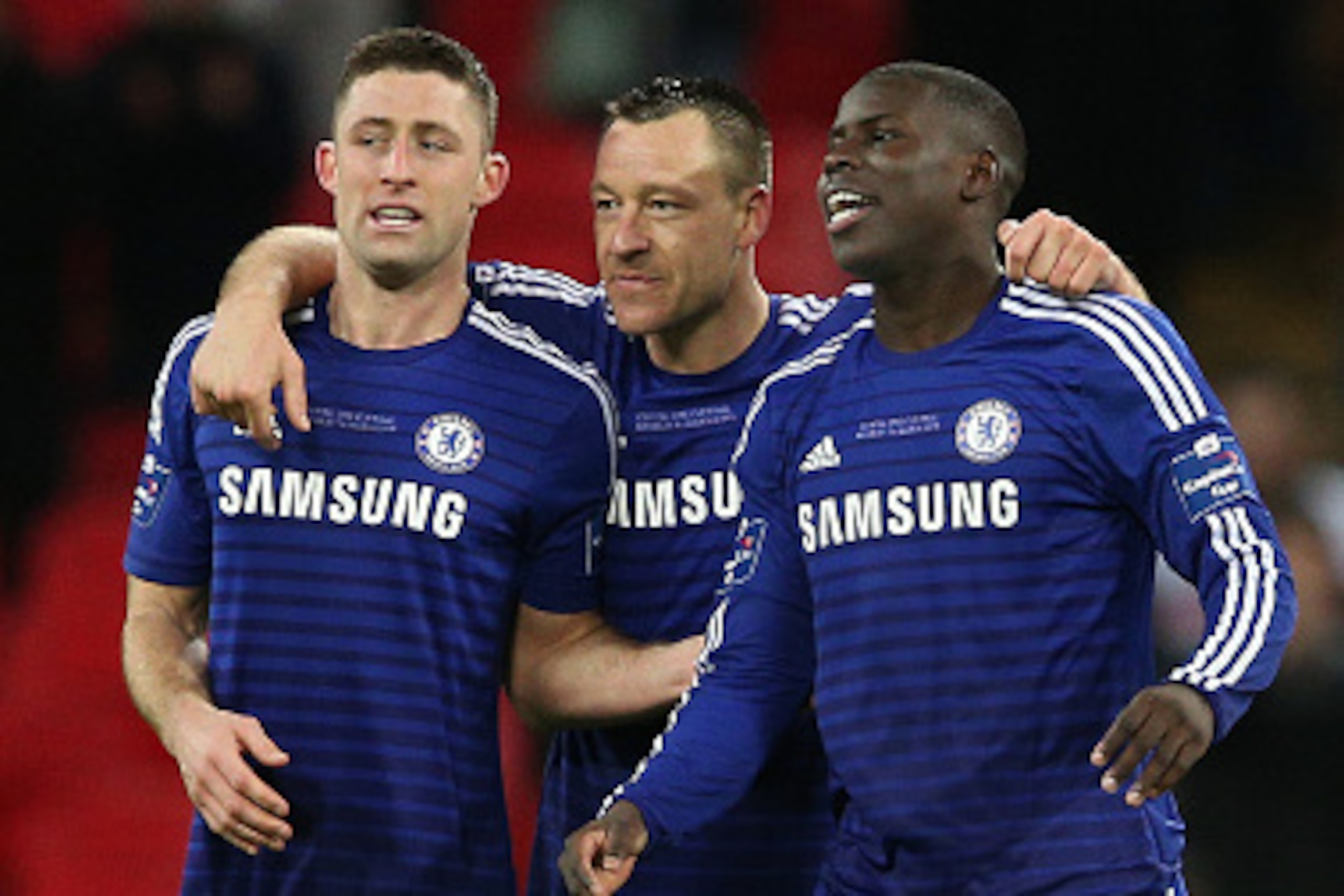 LONDON, ENGLAND - MARCH 01:  (L-R) Gary Cahill, John Terry and Kurt Zouma of Chelsea celebrate after victory in the Capital One Cup Final match between Chelsea and Tottenham Hotspur at Wembley Stadium on March 1, 2015 in London, England.  (Photo by Clive 