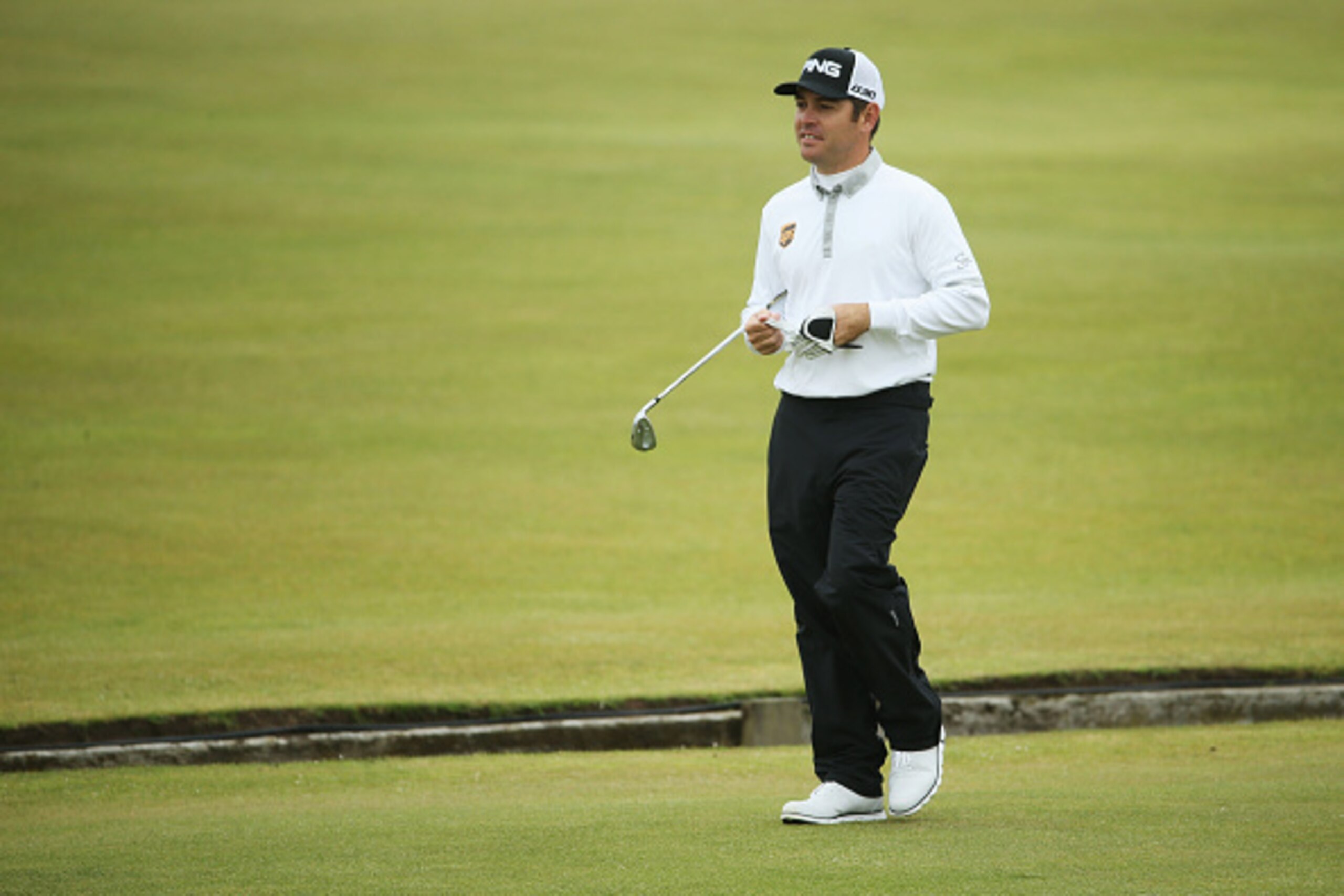 ST ANDREWS, SCOTLAND - JULY 13: Louis Oosthuizen of South Africa plays a practice round ahead of the 144th Open Championship at The Old Course on July 13, 2015 in St Andrews, Scotland. (Photo by Streeter Lecka/Getty Images) ST ANDREWS, SCOTLAND - JULY 13: Louis Oosthuizen of South Africa plays a practice round ahead of the 144th Open Championship at The Old Course on July 13, 2015 in St Andrews, Scotland. (Photo by Streeter Lecka/Getty Images)