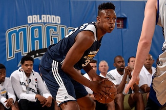 ORLANDO, FL - JULY 8: Myles Turner #33 of the Indiana Pacers handles the ball against the Detroit Pistons on July 8, 2015 at Amway Center in Orlando, Florida. NOTE TO USER: User expressly acknowledges and agrees that, by downloading and or using this phot