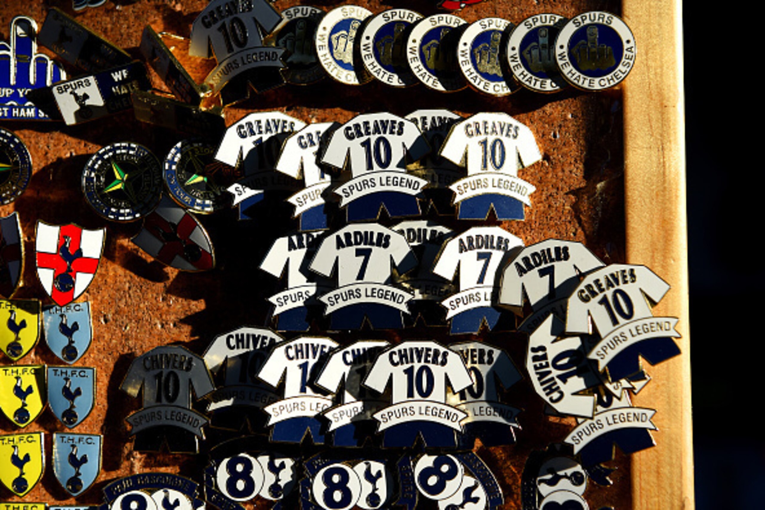 LONDON, ENGLAND - DECEMBER 06: Tottenham Hotspur badges are displayed for sale at a stall outside the stadium before the Barclays Premier League match between Tottenham Hotspur and Crystal Palace at White Hart Lane on December 6, 2014 in London, England. LONDON, ENGLAND - DECEMBER 06: Tottenham Hotspur badges are displayed for sale at a stall outside the stadium before the Barclays Premier League match between Tottenham Hotspur and Crystal Palace at White Hart Lane on December 6, 2014 in London, England.