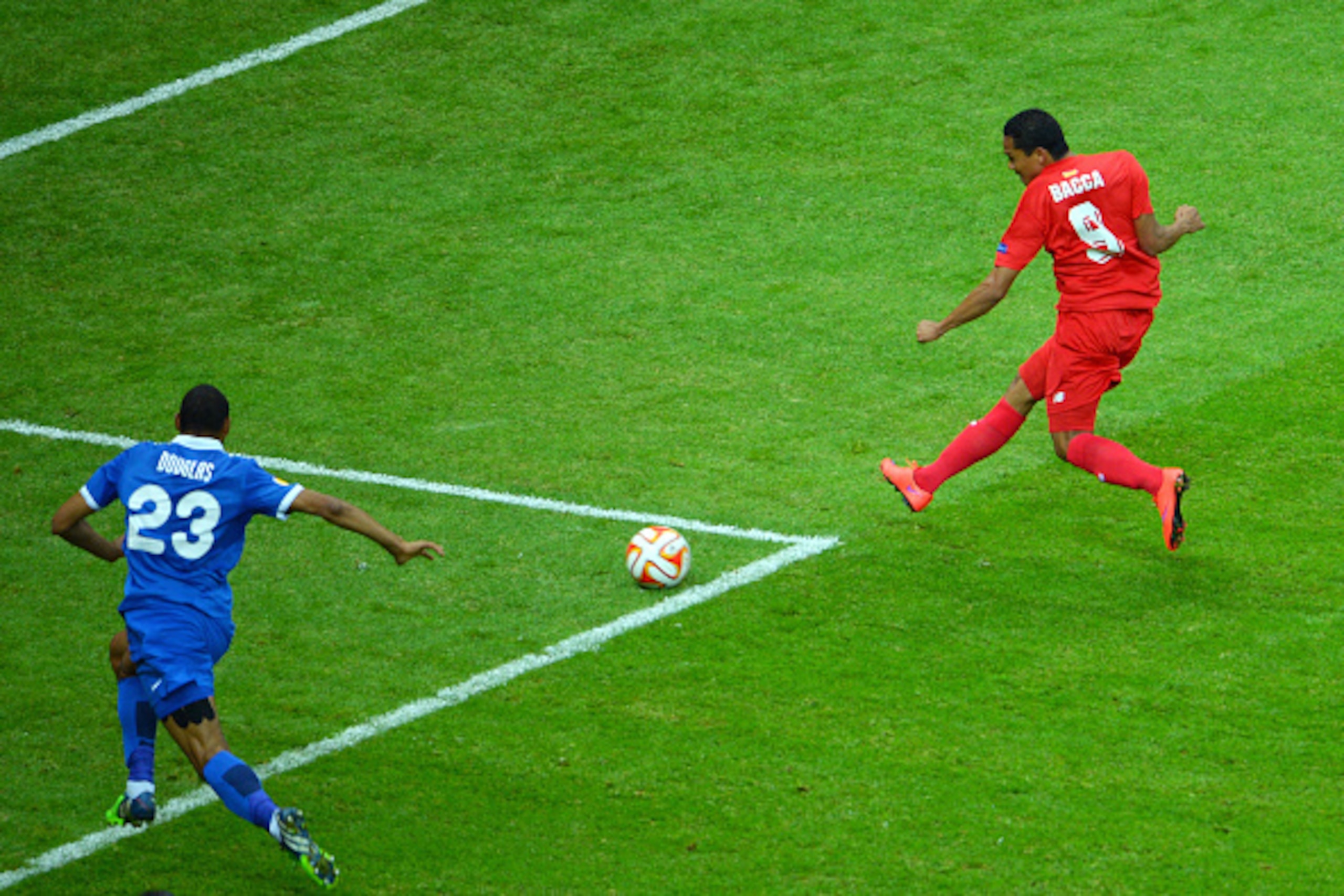 WARSAW, POLAND - MAY 27:  Carlos Bacca of Sevilla scores his team's second goal during the UEFA Europa League Final match between FC Dnipro Dnipropetrovsk and FC Sevilla on May 27, 2015 in Warsaw, Poland.  (Photo by Dan Mullan/Getty Images)