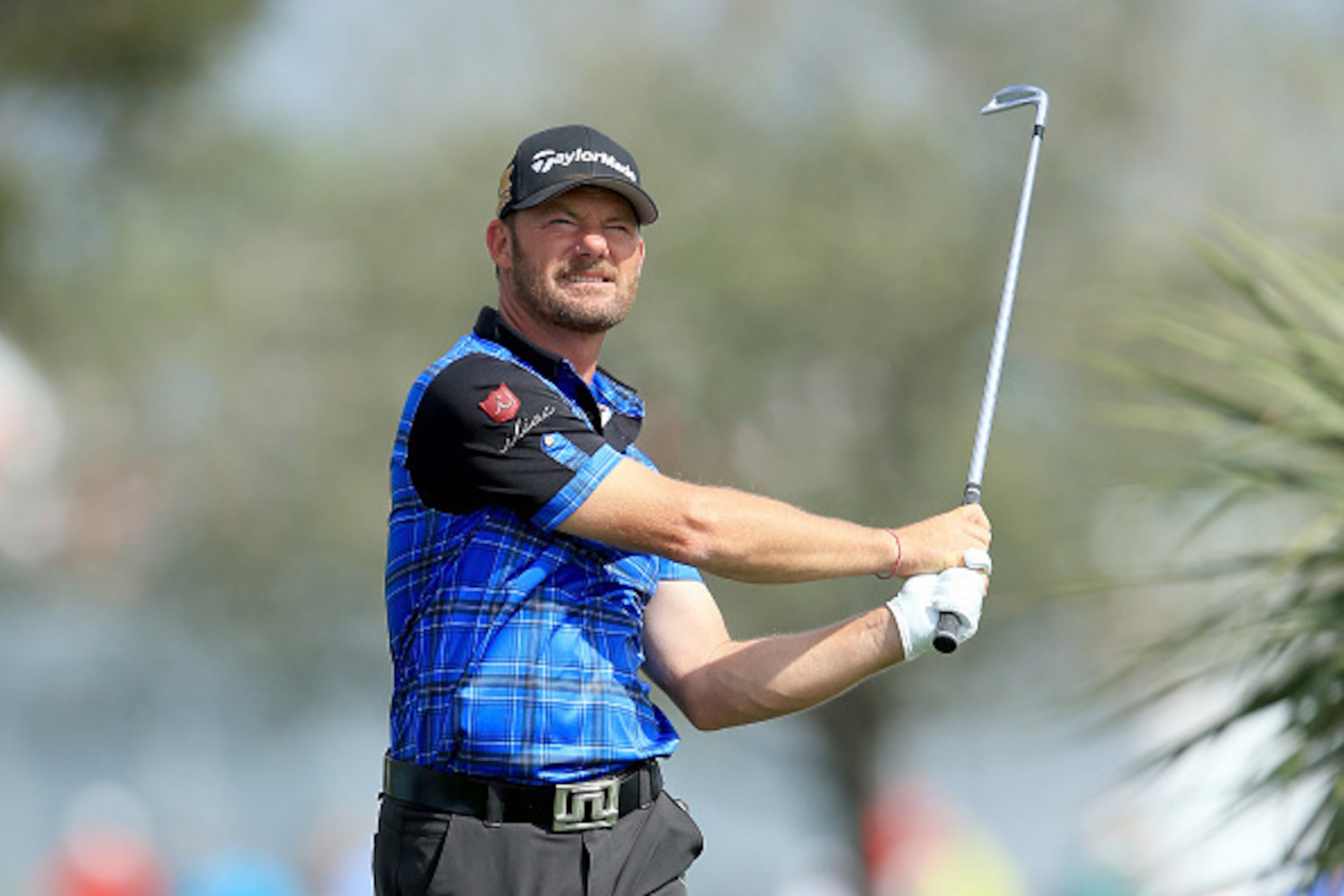 PALM BEACH GARDENS, FL - FEBRUARY 26:  Alex Cjeka of Germany plays his tee shot on the par 3, fifth hole during the first round of The Honda Classic on the Champions Course at the PGA National Resort and Spa on February 26, 2015 in Palm Beach Gardens, Flo