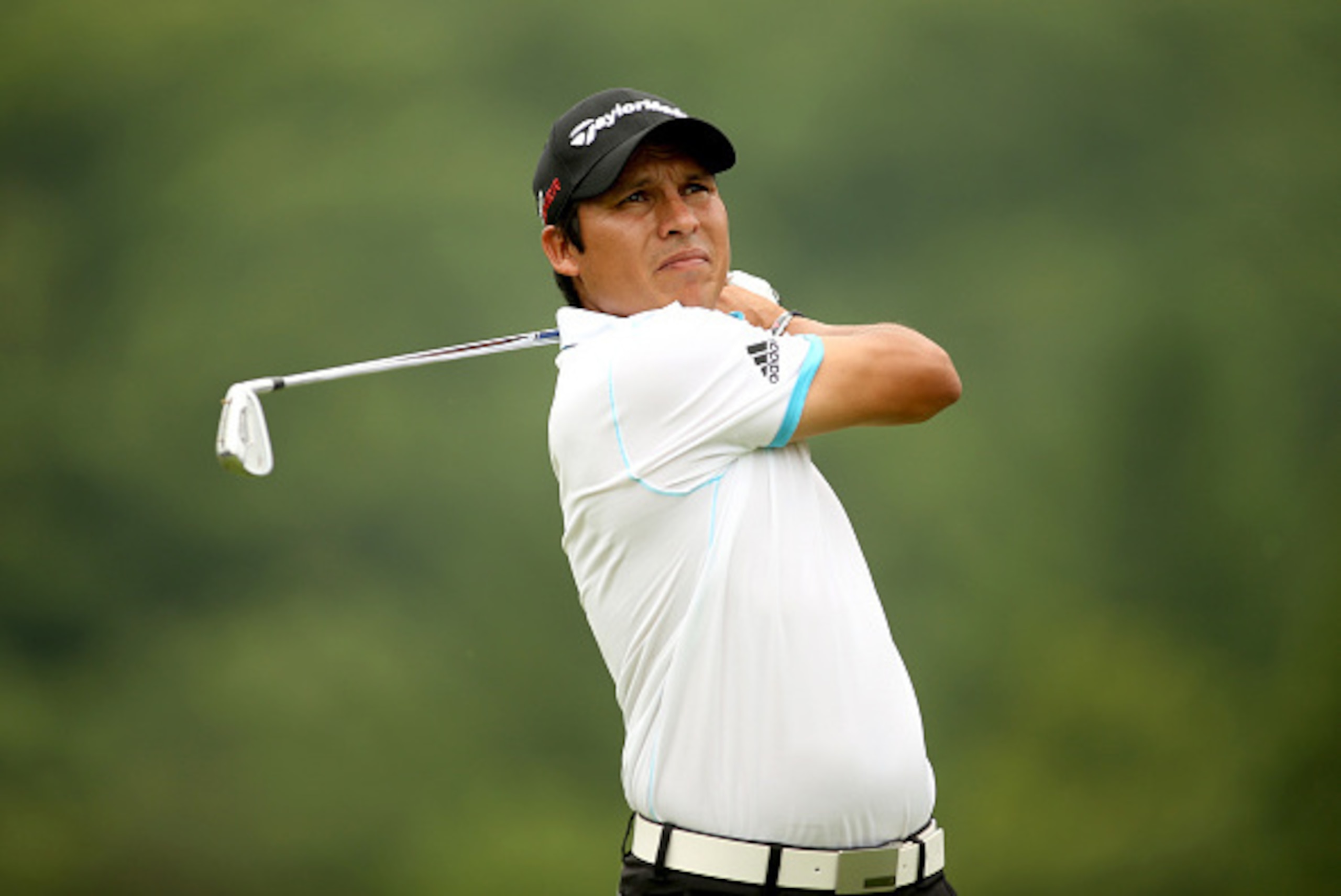 WHITE SULPHUR SPRINGS, WV - JULY 05: Andres Romero of Argentina tees off on the third hole during the final round of the Greenbrier Classic held at The Old White TPC on July 5, 2015 in White Sulphur Springs, West Virginia.  (Photo by Darren Carroll/Getty 