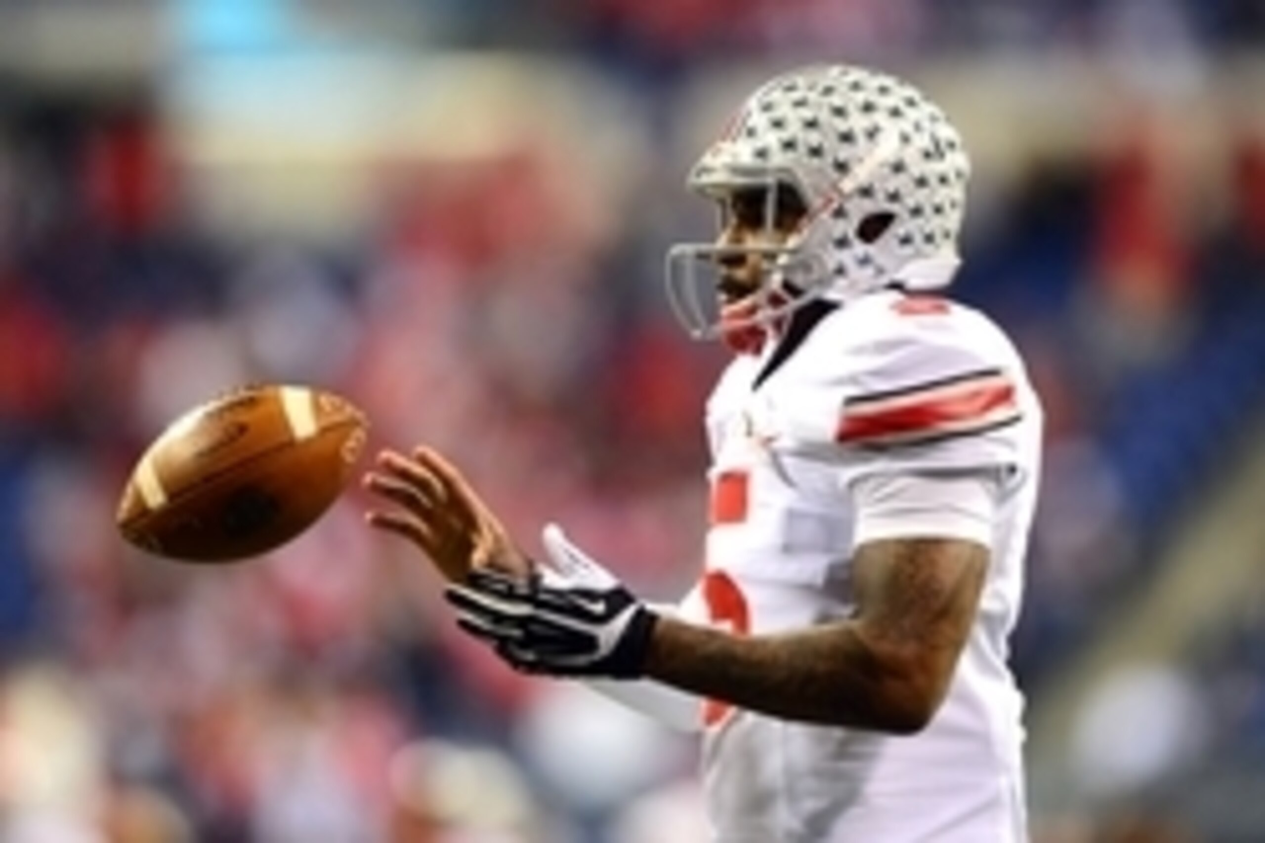 Dec 7, 2013; Indianapolis, IN, USA; Ohio State Buckeyes quarterback Braxton Miller (5) warms up prior to the 2013 Big 10 Championship game against the Michigan State Spartans at Lucas Oil Stadium. Mandatory Credit: Andrew Weber-USA TODAY Sports