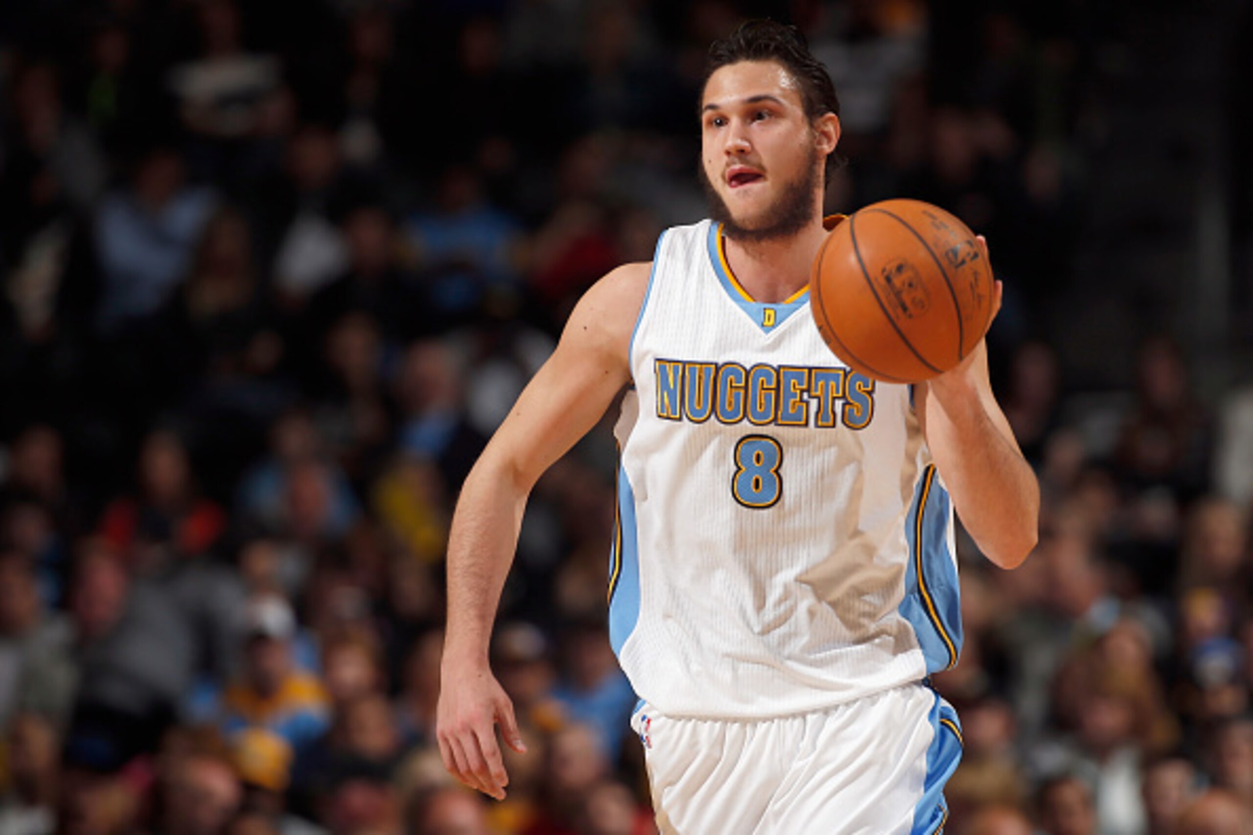 DENVER, CO - APRIL 08:  Danilo Gallinari #8 of the Denver Nuggets brings the ball upcourt against the Los Angeles Lakers at Pepsi Center on April 8, 2015 in Denver, Colorado. The Nuggets defeated the Lakers 119-101. NOTE TO USER: User expressly acknowledg