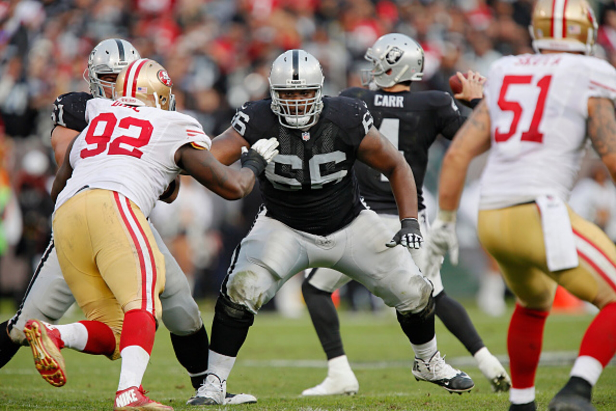 OAKLAND, CA - DECEMBER 7:  Guard Gabe Jackson #66 of the Oakland Raiders blocks against the San Francisco 49ers in the fourth quarter on December 7, 2014 at O.co Coliseum in Oakland, California.  The Raiders won 24-13.  (Photo by Brian Bahr/Getty Images)