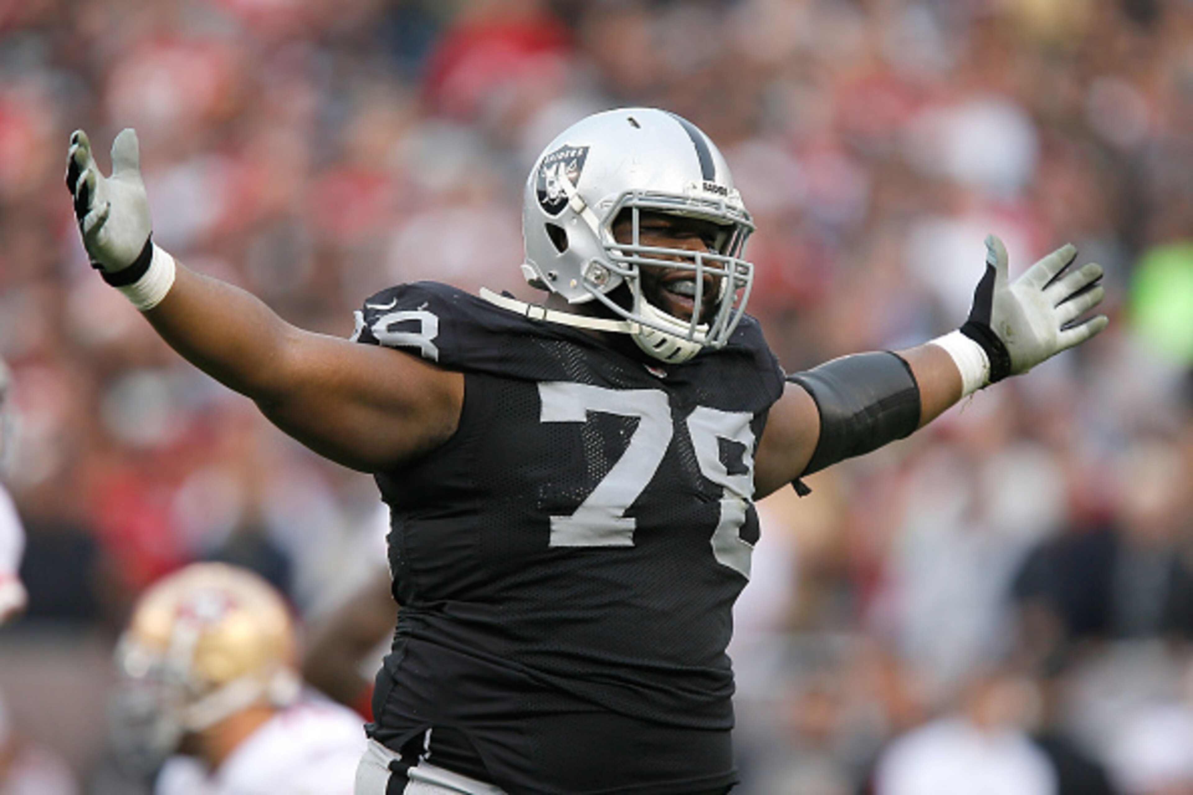 OAKLAND, CA - DECEMBER 07: Justin Ellis #78 of the Oakland Raiders celebrates after tackling Frank Gore #21 of the San Francisco 49ers in the fourth quarter at O.co Coliseum on December 7, 2014 in Oakland, California. (Photo by Brian Bahr/Getty Images) OAKLAND, CA - DECEMBER 07: Justin Ellis #78 of the Oakland Raiders celebrates after tackling Frank Gore #21 of the San Francisco 49ers in the fourth quarter at O.co Coliseum on December 7, 2014 in Oakland, California. (Photo by Brian Bahr/Getty Images)