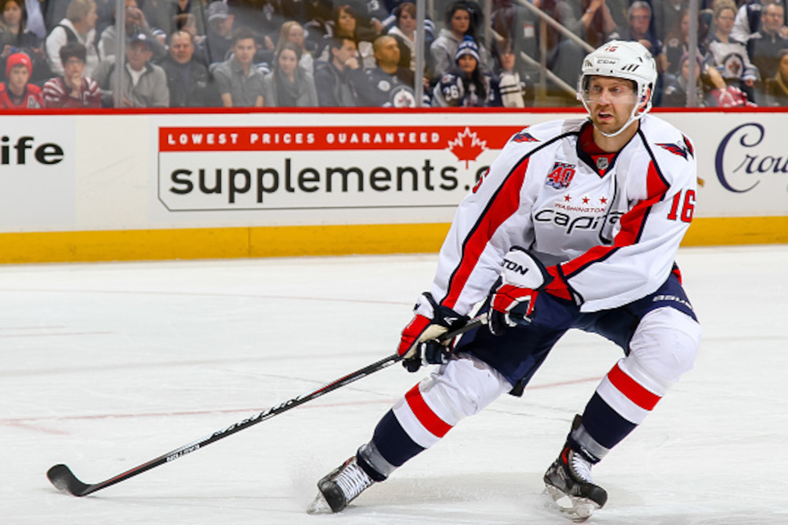 WINNIPEG, CANADA - MARCH 21: Eric Fehr #16 of the Washington Capitals keeps an eye on the play during first period action against the Winnipeg Jets on March 21, 2015 at the MTS Centre in Winnipeg, Manitoba, Canada. The Jets defeated the Caps 3-0. (Photo b WINNIPEG, CANADA - MARCH 21: Eric Fehr #16 of the Washington Capitals keeps an eye on the play during first period action against the Winnipeg Jets on March 21, 2015 at the MTS Centre in Winnipeg, Manitoba, Canada. The Jets defeated the Caps 3-0. (Photo b