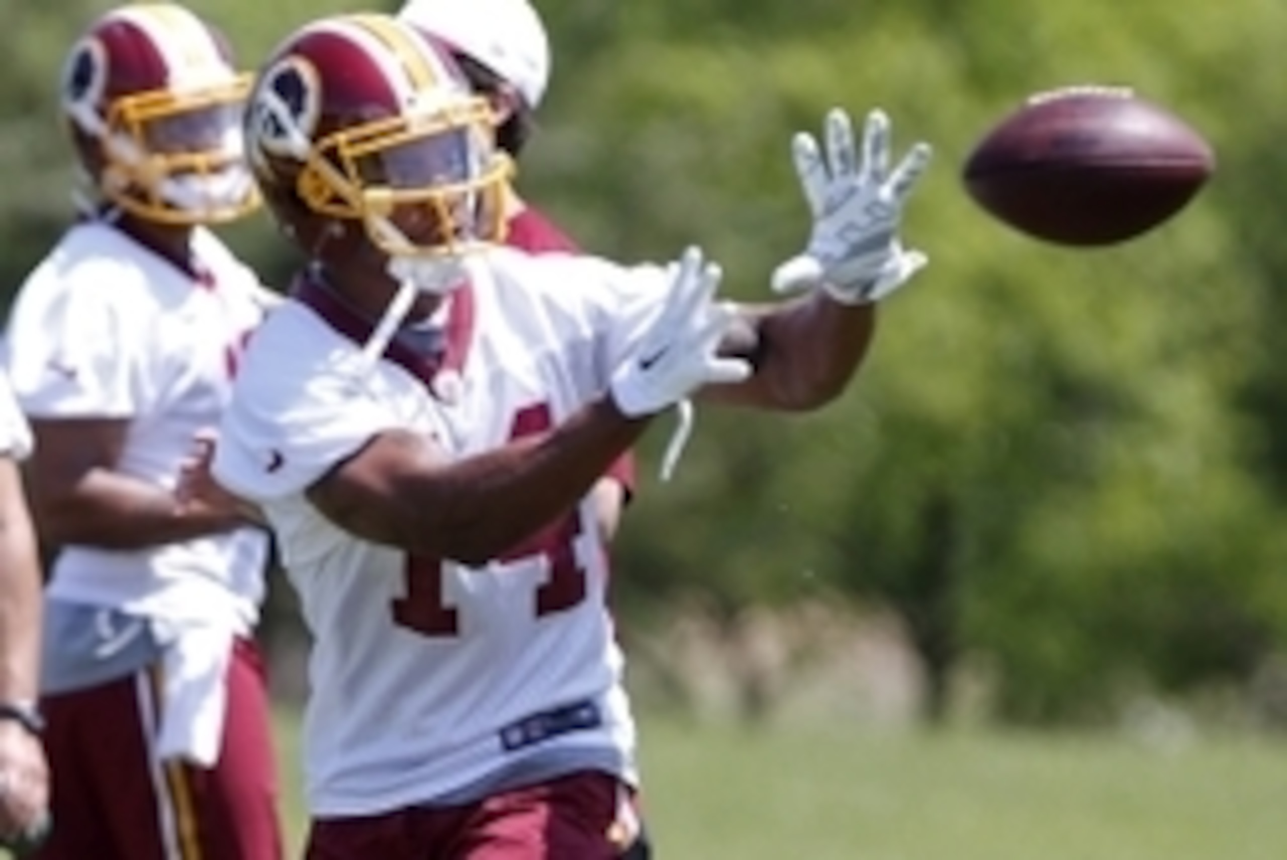 May 26, 2015; Ashbury, VA, USA; Washington Redskins wide receiver Ryan Grant (14) catches the ball during the Redskins OTA at Redskins Park. Mandatory Credit: Geoff Burke-USA TODAY Sports
