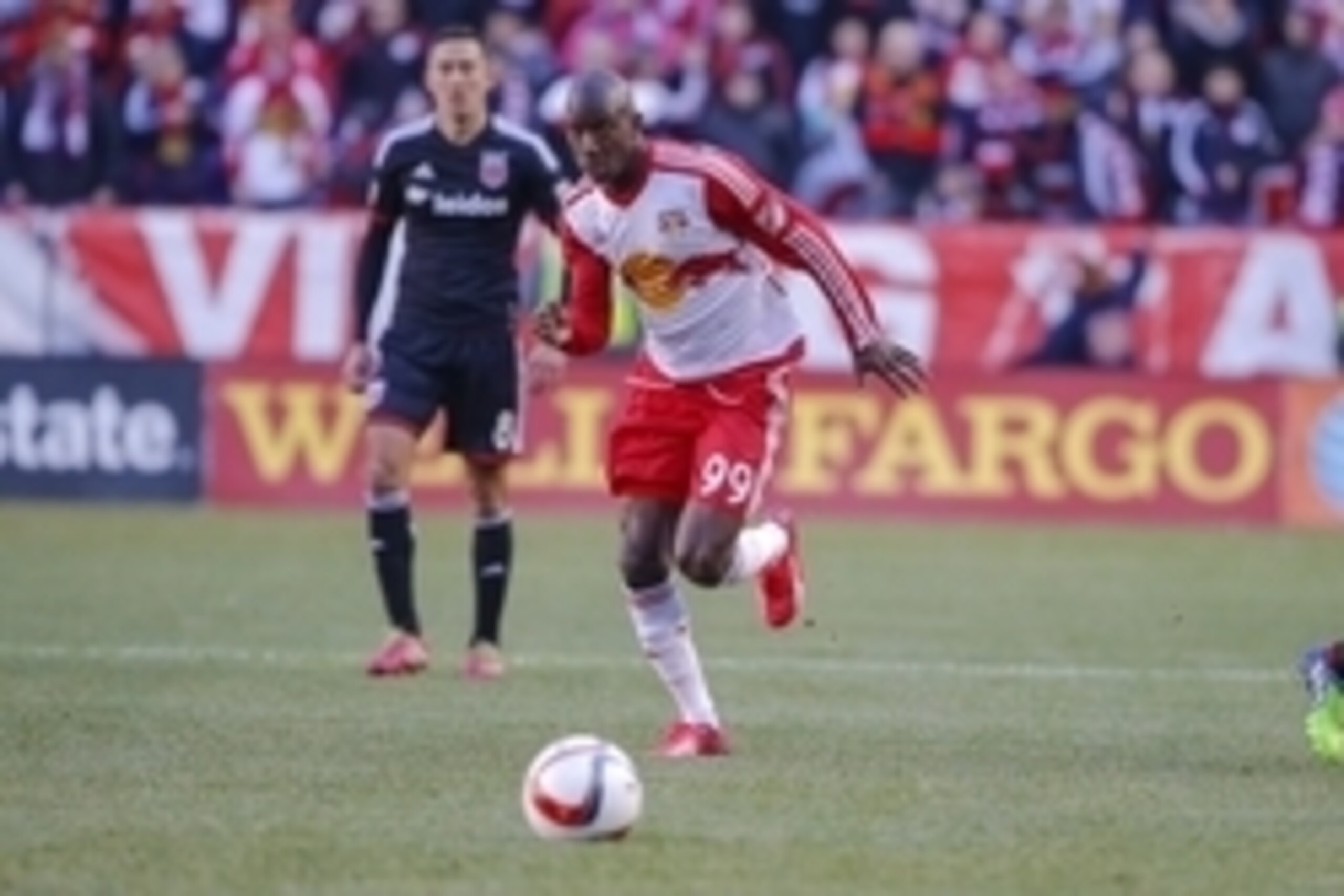 Mar 22, 2015; Harrison, NJ, USA;  New York Red Bulls forward Bradley Wright-Phillips (99) brings the ball upfield during the first half against the D.C. United at Red Bull Arena. Mandatory Credit: Jim O'Connor-USA TODAY Sports