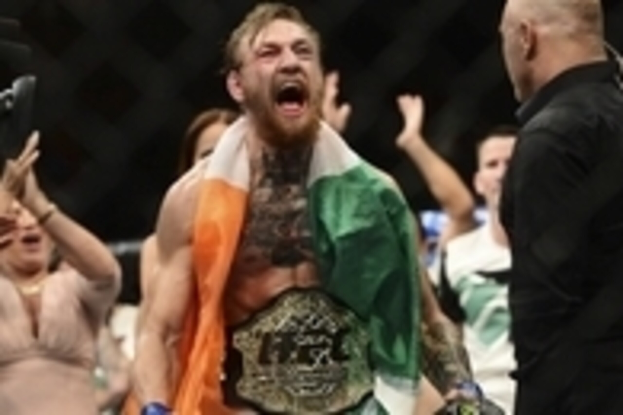 Jul 11, 2015; Las Vegas, NV, USA; Conor McGregor (blue gloves) celebrates after defeating Chad Mendes (not pictured) during their interim featherweight title bout during UFC 189 at MGM Grand Garden Arena. McGregor won via second round TKO. Mandatory Cred Jul 11, 2015; Las Vegas, NV, USA; Conor McGregor (blue gloves) celebrates after defeating Chad Mendes (not pictured) during their interim featherweight title bout during UFC 189 at MGM Grand Garden Arena. McGregor won via second round TKO. Mandatory Cred