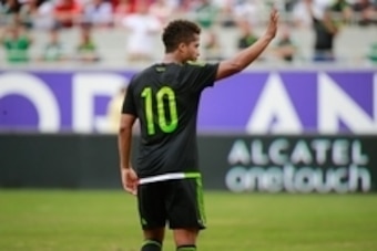 Jun 27, 2015; Orlando, FL, USA; Mexico forward Giovani dos Santos (10) waves during the second half at Orlando Citrus Bowl. Costa Rica and Mexico tied 2-2. Mandatory Credit: Kim Klement-USA TODAY Sports
