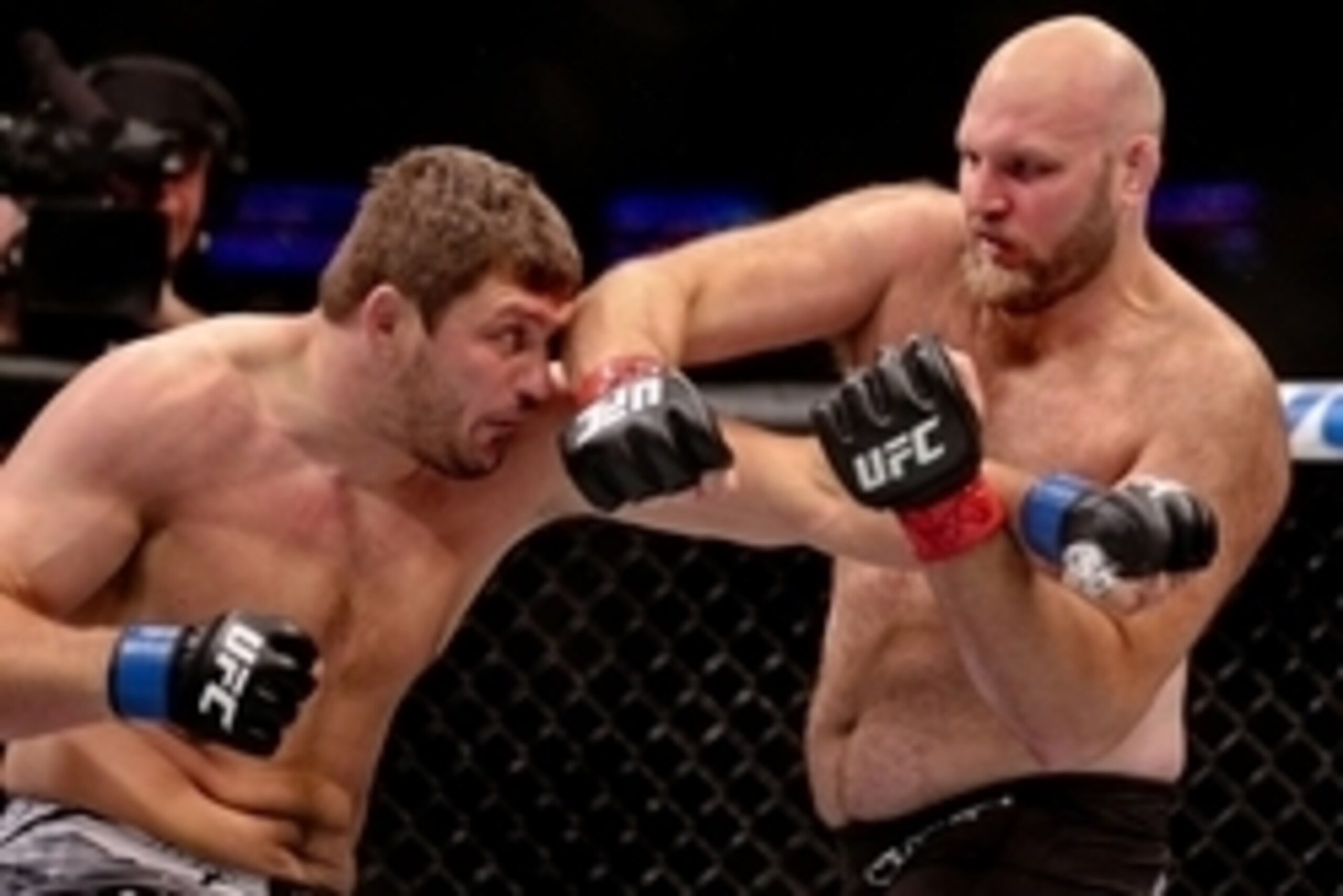 Jun 6, 2015; New Orleans, LA, USA; Ben Rothwell (red gloves) fights Matt Mitrione (blue gloves) during UFC Fight Night at the Smoothie King Center. Mandatory Credit: Derick E. Hingle-USA TODAY Sports