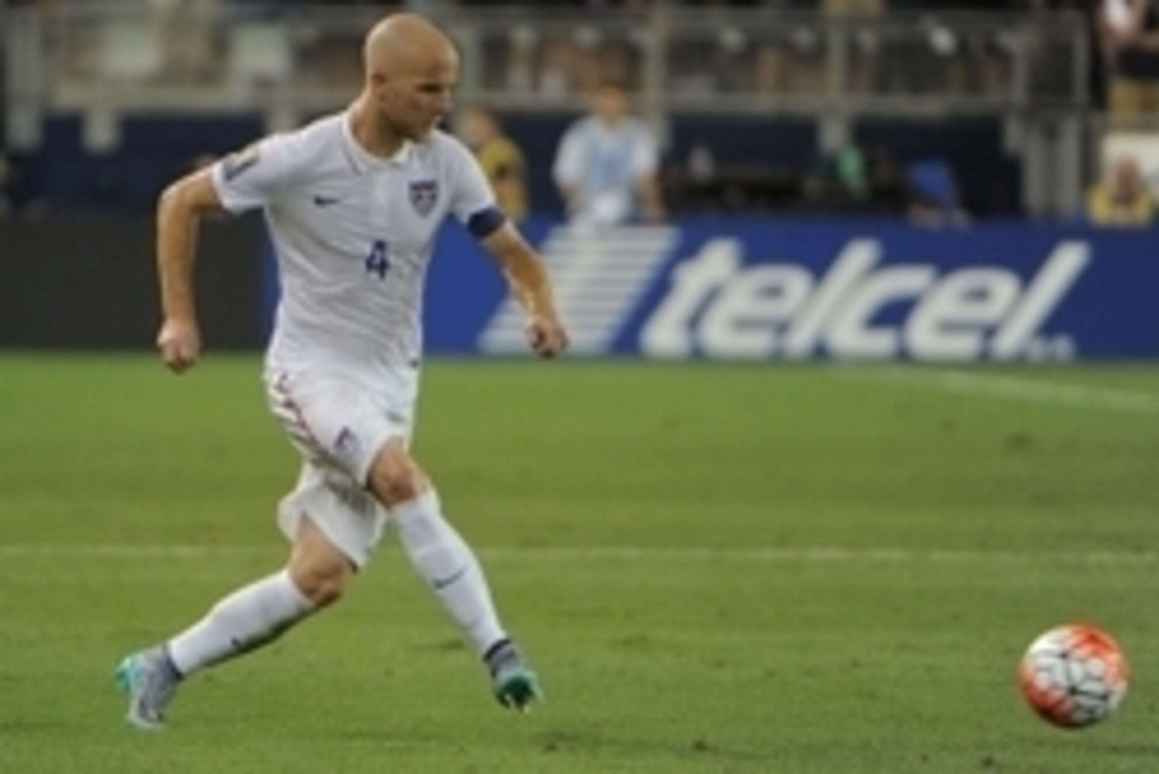 Jul 13, 2015; Kansas City, MO, USA; USA midfielder Michael Bradley (4) kicks the ball against Panama in the second half during CONCACAF Gold Cup group play at Sporting Park. The game ended in a 1-1 tie. Mandatory Credit: John Rieger-USA TODAY Sports