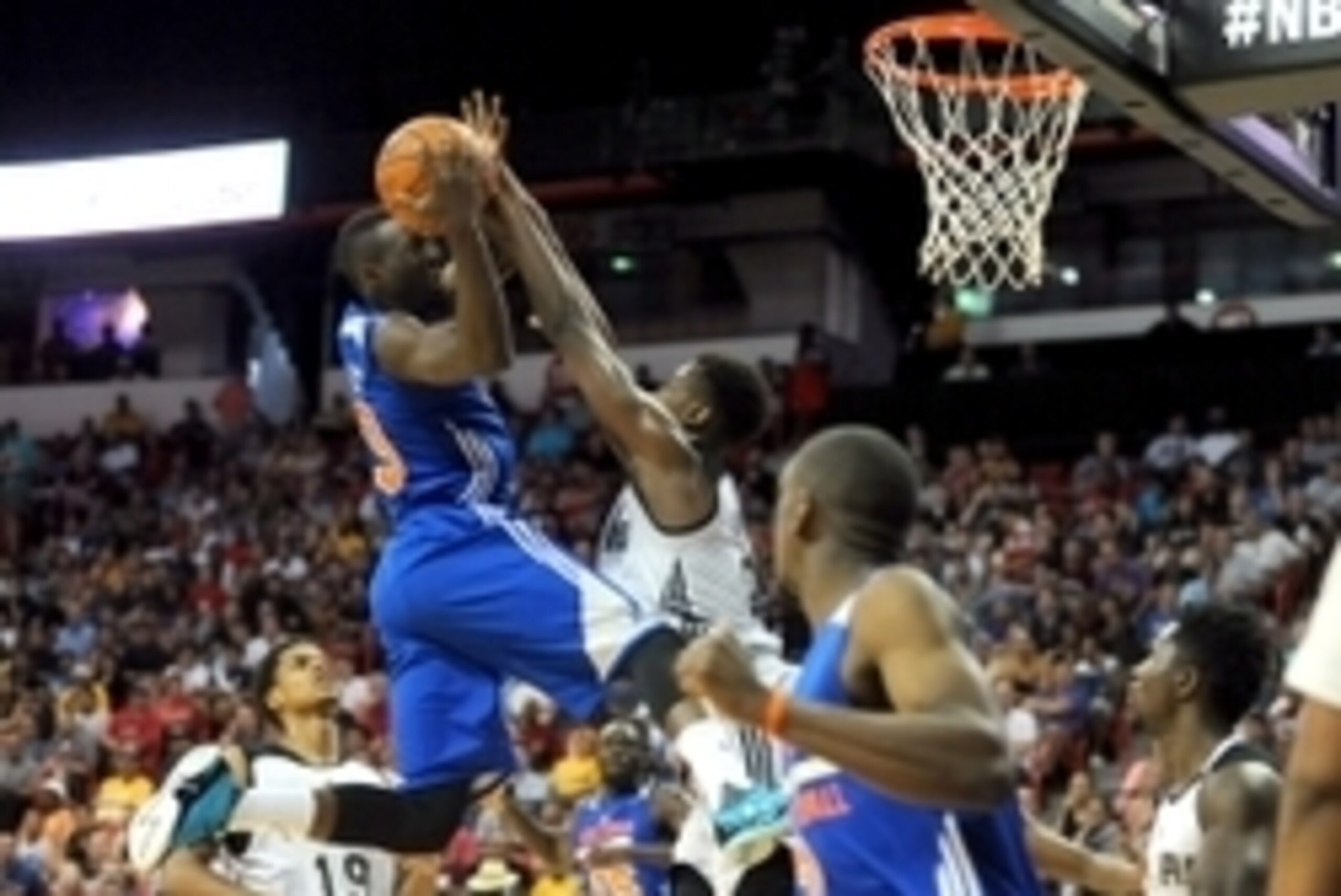 Jul 11, 2015; Las Vegas, NV, USA; New York Knicks guard Jerian Grant (13) shoots against the defense of San Antonio Spurs forward Livio Jean-Charles (28) during an NBA Summer League game at Thomas & Mack Center. Mandatory Credit: Stephen R. Sylvanie-USA T