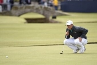 Jul 16, 2015; St. Andrews, Fife, SCT; Jordan Spieth lines up his birdie putt on the first hole during the first round for the 144th Open Championship at St. Andrews - Old Course. Mandatory Credit: Ian Rutherford-USA TODAY Sports