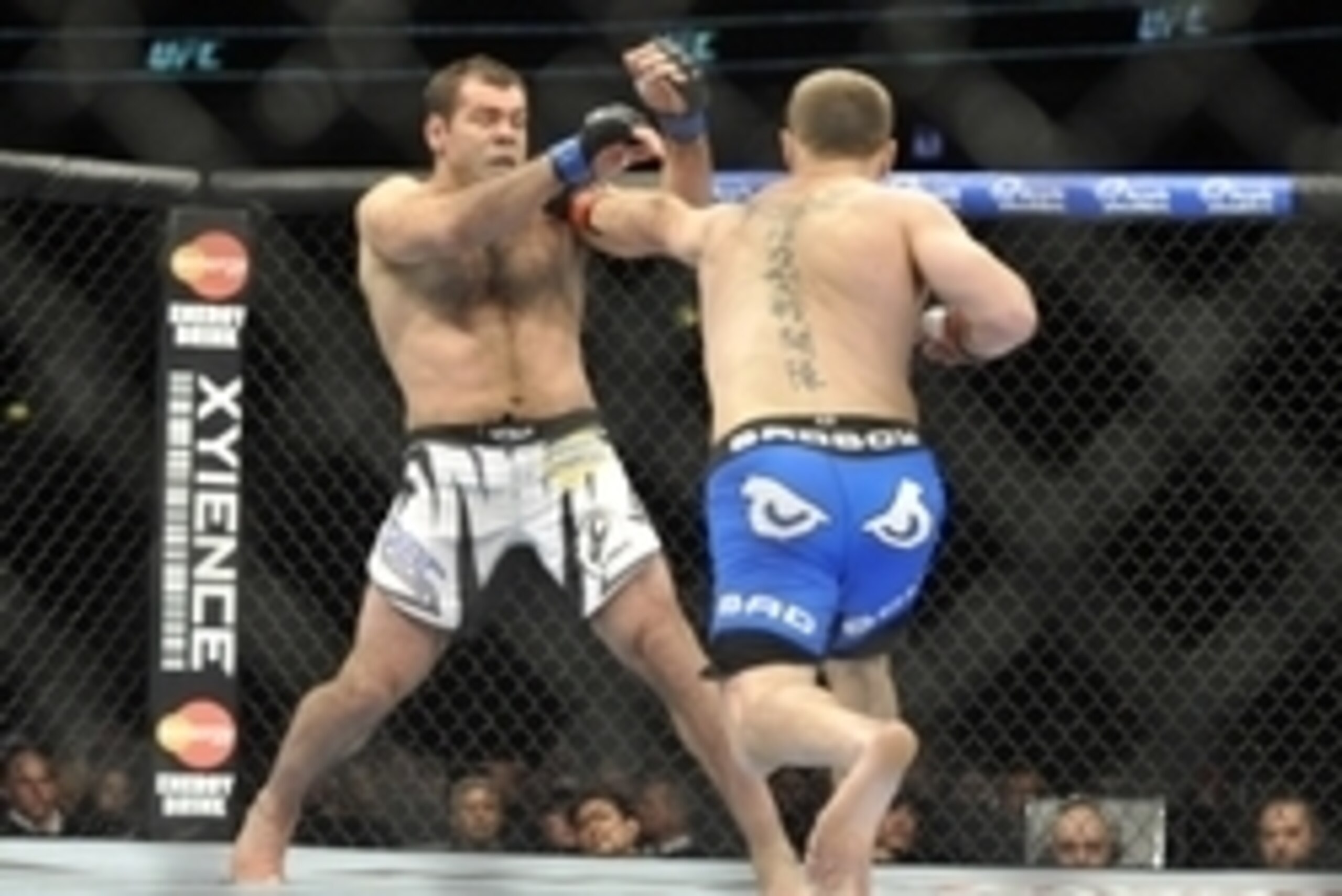 Jan 25, 2014; Chicago, IL, USA; Stipe Miocic (red gloves) fights Gabriel Gonzaga (blue gloves) during UFC on FOX 10 at the United Center. Mandatory Credit: David Banks-USA TODAY Sports