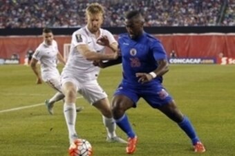 Jul 10, 2015; Foxborough, MA, USA; United States defender Tim Ream (15) defends against Haiti midfielder Sony Norde (20) during the second half of a CONCACAF Gold Cup group play match at Gillette Stadium. United States defeated Haiti 1-0. Mandatory Credit