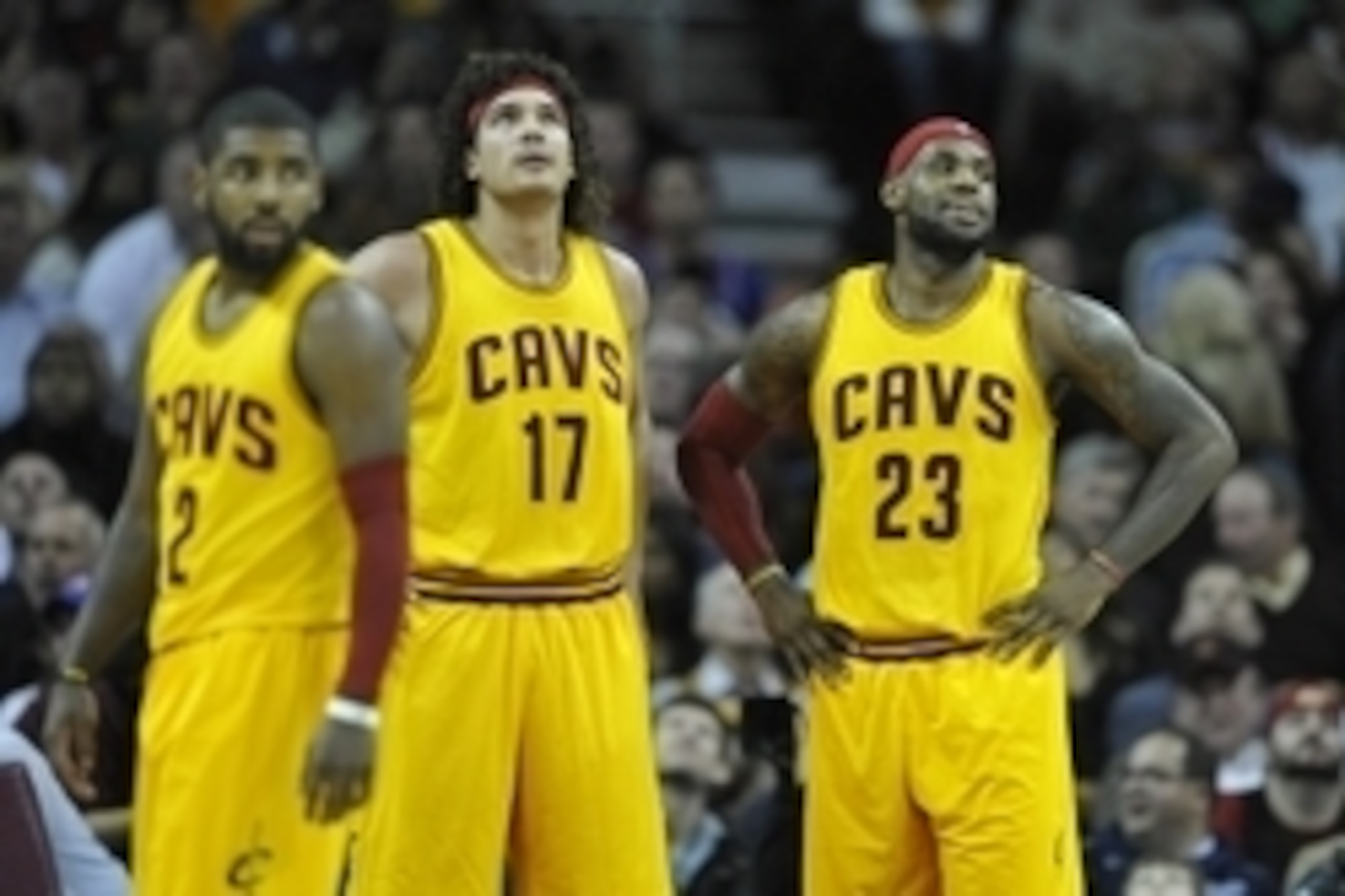 Nov 19, 2014; Cleveland, OH, USA; Cleveland Cavaliers forward LeBron James (23), center Anderson Varejao (17) and guard Kyrie Irving (2) react against the San Antonio Spurs at Quicken Loans Arena. The Spurs won 92-90. Mandatory Credit: David Richard-USA T