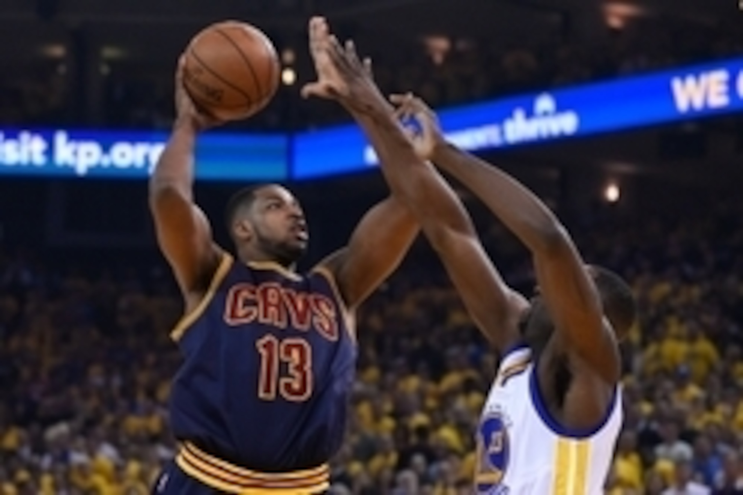 June 4, 2015; Oakland, CA, USA; Cleveland Cavaliers center Tristan Thompson (13) shoots the basketball against Golden State Warriors forward Draymond Green (23) during the first quarter in game one of the NBA Finals at Oracle Arena. The Warriors defeated 