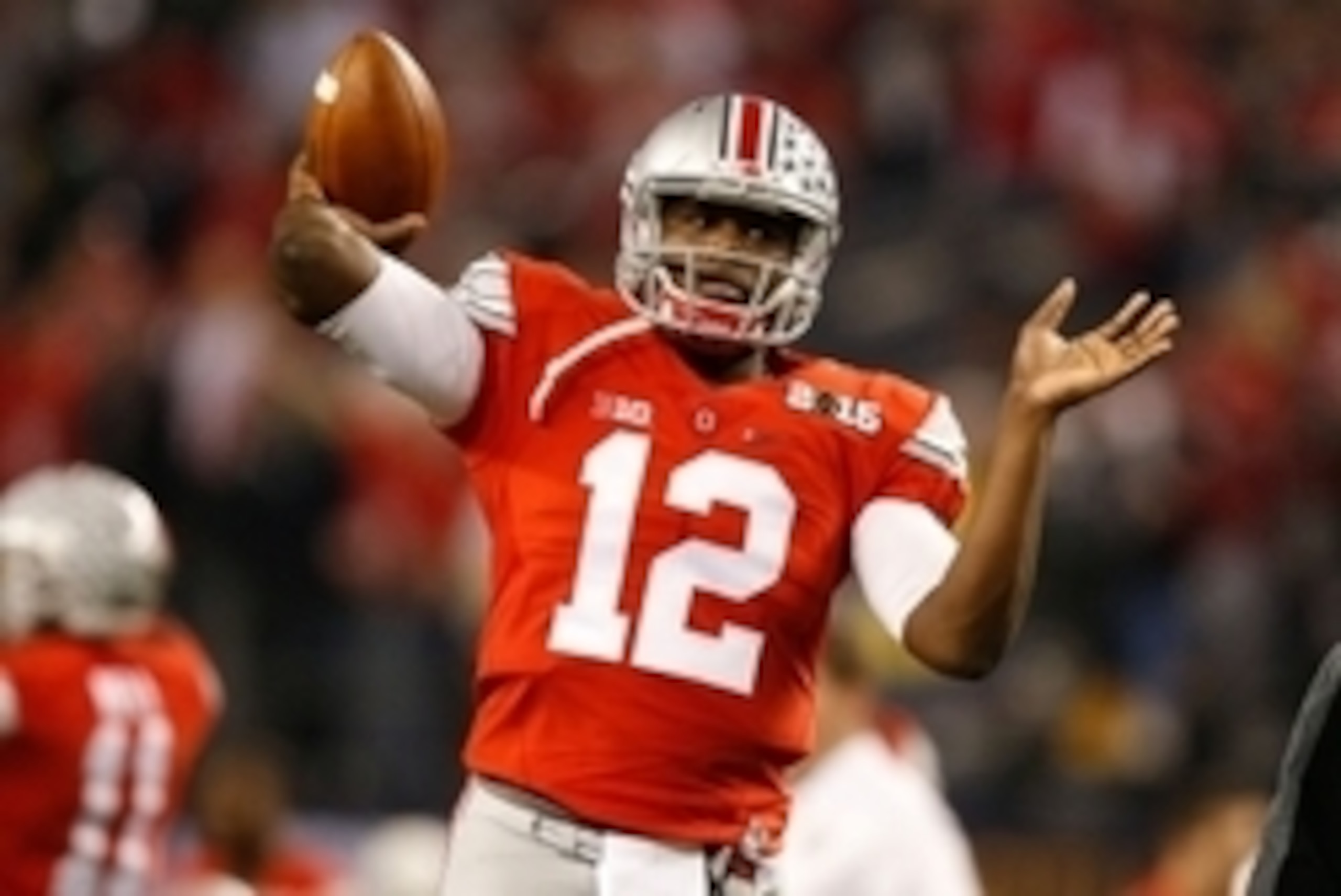 Jan 12, 2015; Arlington, TX, USA; Ohio State Buckeyes quarterback Cardale Jones (12) throws the ball in warmups before the game against the Oregon Ducks in the 2015 CFP National Championship Game at AT&T Stadium. Ohio State won 42-20. Mandatory Credit: Ti