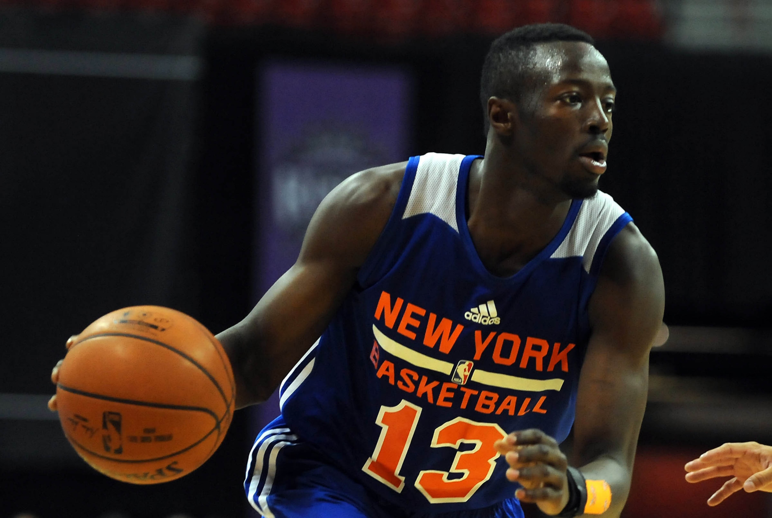 Jul 14, 2015; Las Vegas, NV, USA; New York Knicks guard Jerian Grant (13) dribbles the ball during an NBA Summer League game against the 76ers at Thomas & Mack Center. The Knicks won the game in overtime, 84-81. Mandatory Credit: Stephen R. Sylvanie-USA T