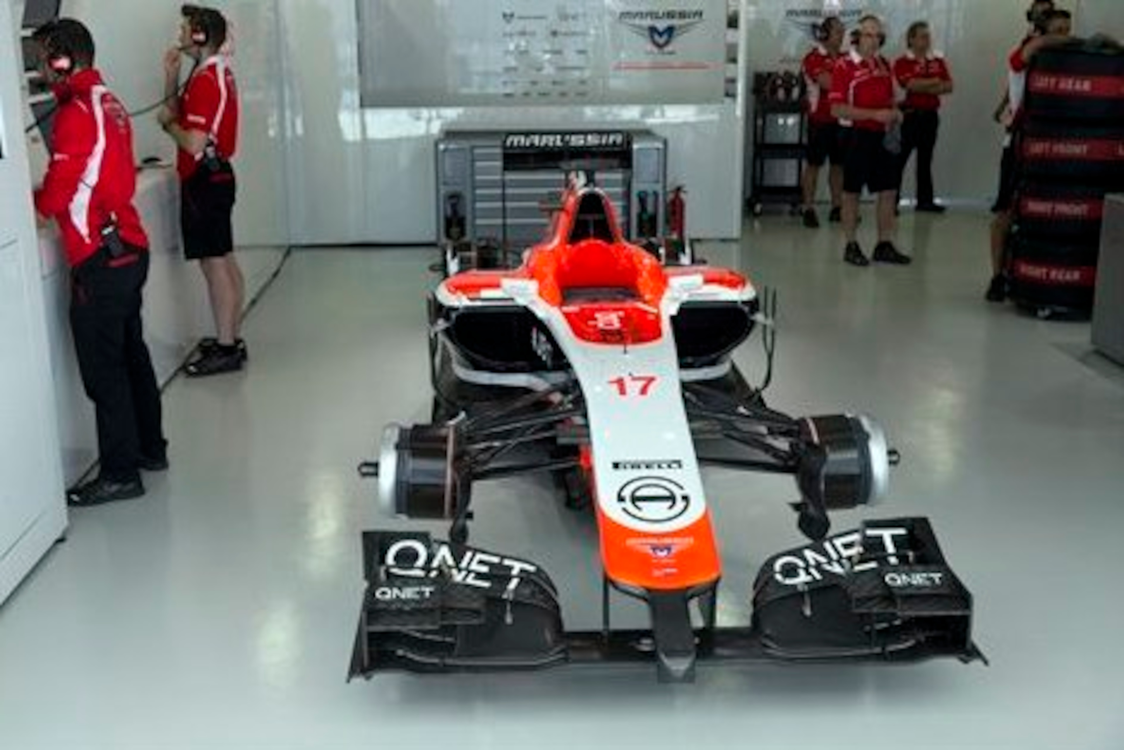 Bianchi's car sits empty in the Marussia garage at the Russian Grand Prix, the race after his crash.