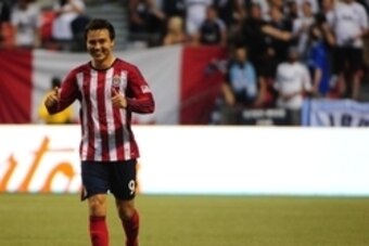 Jul 12, 2014; Vancouver, British Columbia, CAN; Chivas USA forward Erick Torres (9) celebrates a goal against Vancouver Whitecaps goalkeeper David Ousted (1) (not pictured) during the second half at BC Place. Chivas USA won 3-1. Mandatory Credit: Anne-Mar