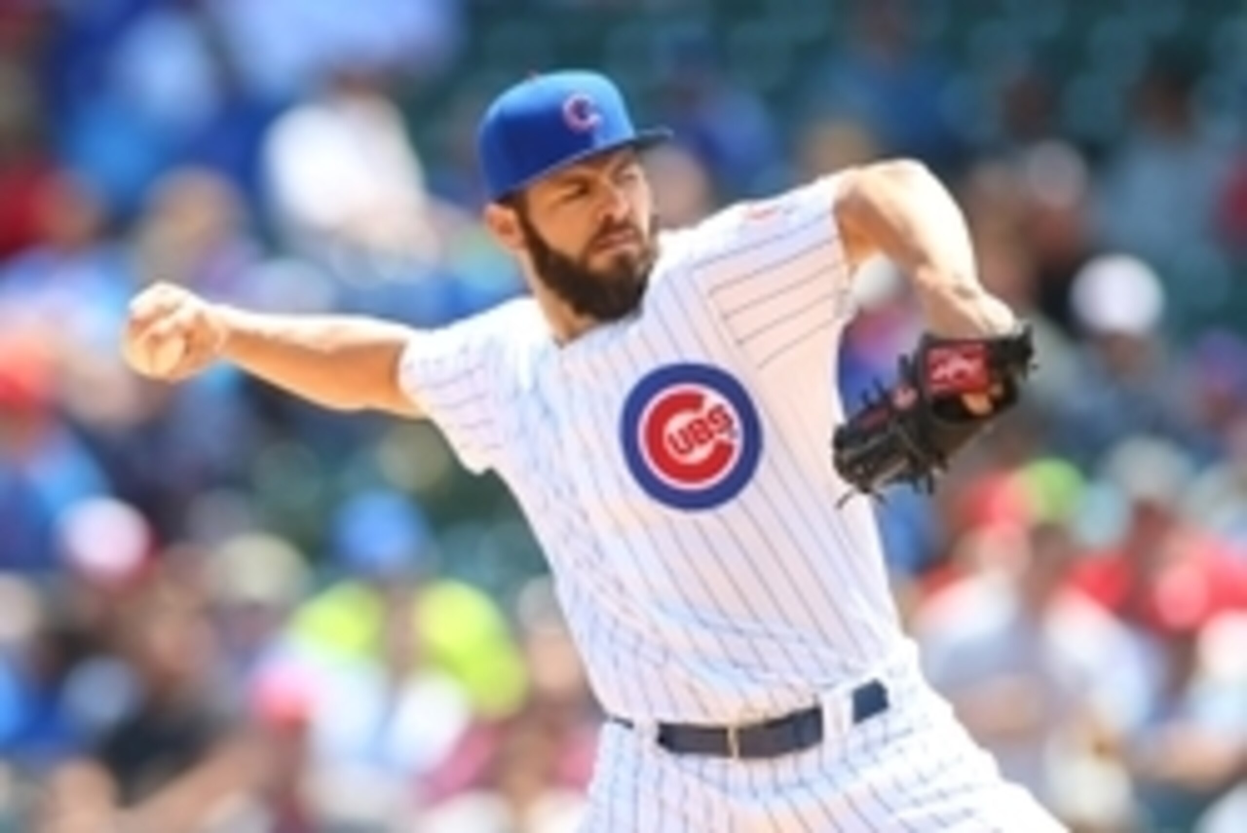 Jul 7, 2015; Chicago, IL, USA; Chicago Cubs starting pitcher Jake Arrieta (49) pitches during the first inning against the St. Louis Cardinals in game one of a baseball doubleheader at Wrigley Field. Mandatory Credit: Caylor Arnold-USA TODAY Sports
