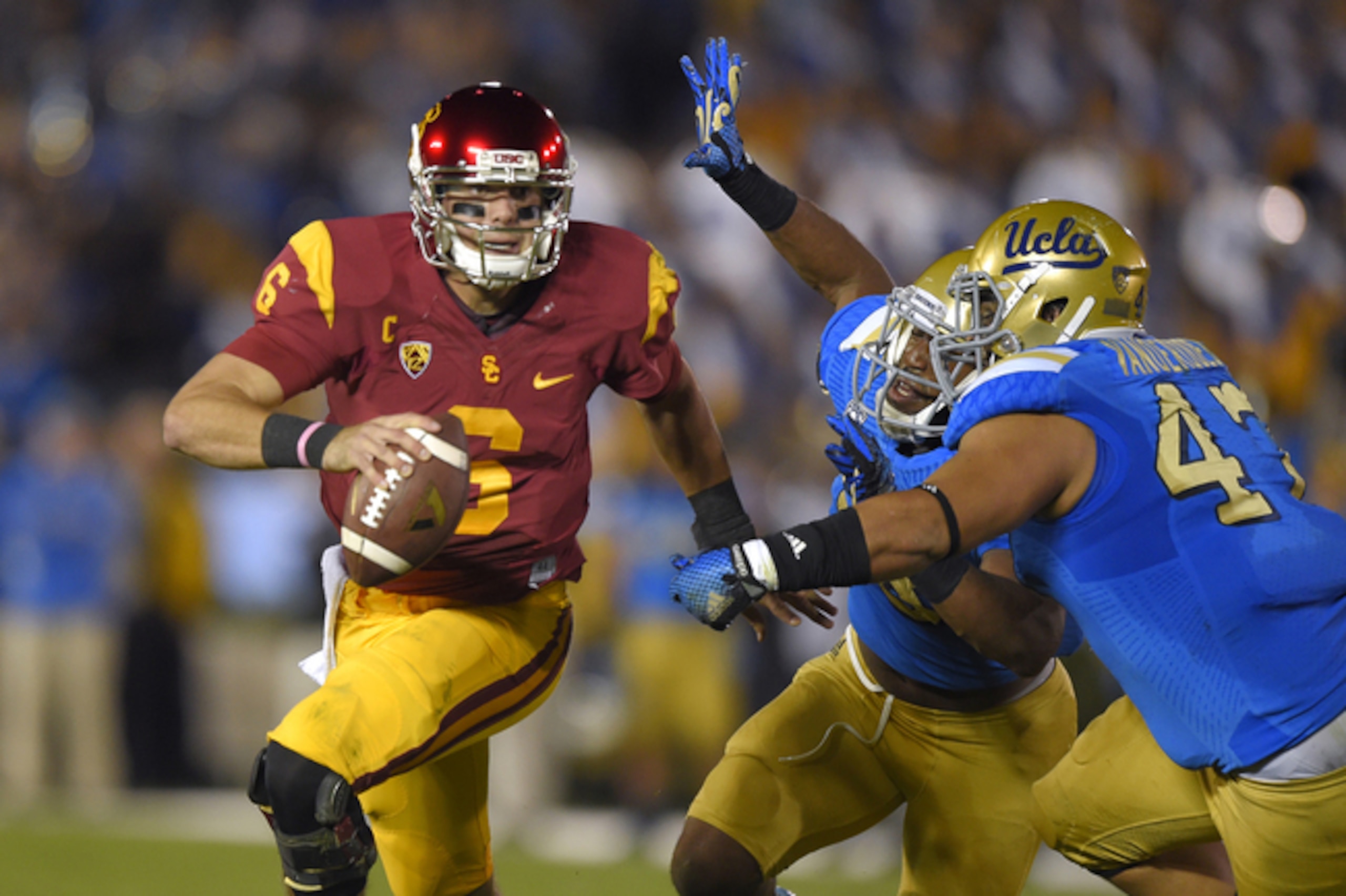 Vanderdoes getting after Cody Kessler. Vanderdoes getting after Cody Kessler.