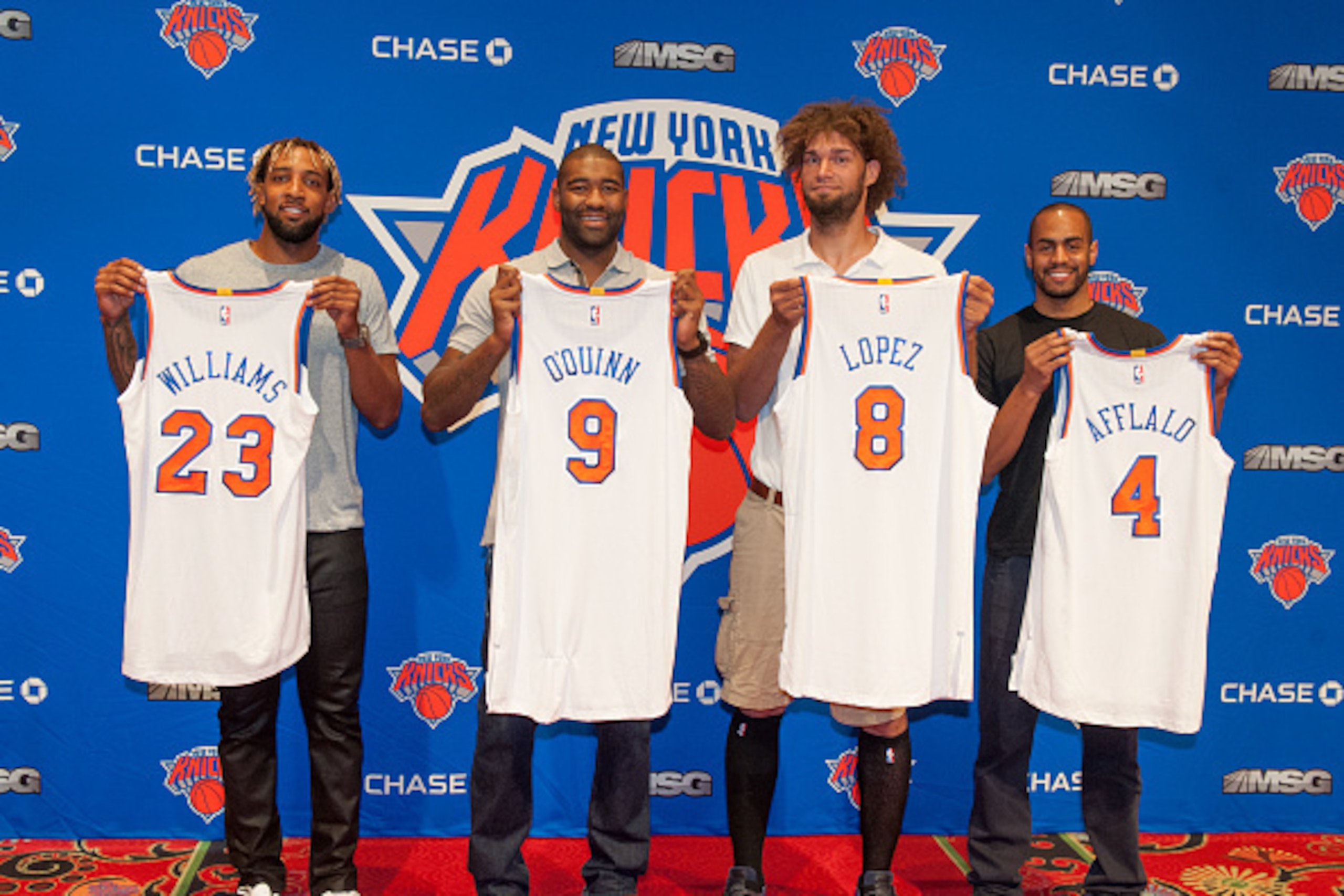 LAS VEGAS, NV - JULY 10: Arron Afflalo #4, Robin Lopez #8, Kyle O'Quinn #9 and Derrick Williams #23 of the New York Knicks are introduced to the public during a press conference on July 10, 2015 at the Wynn Resort in Las Vegas, Nevada. NOTE TO USER: Use LAS VEGAS, NV - JULY 10: Arron Afflalo #4, Robin Lopez #8, Kyle O'Quinn #9 and Derrick Williams #23 of the New York Knicks are introduced to the public during a press conference on July 10, 2015 at the Wynn Resort in Las Vegas, Nevada. NOTE TO USER: Use