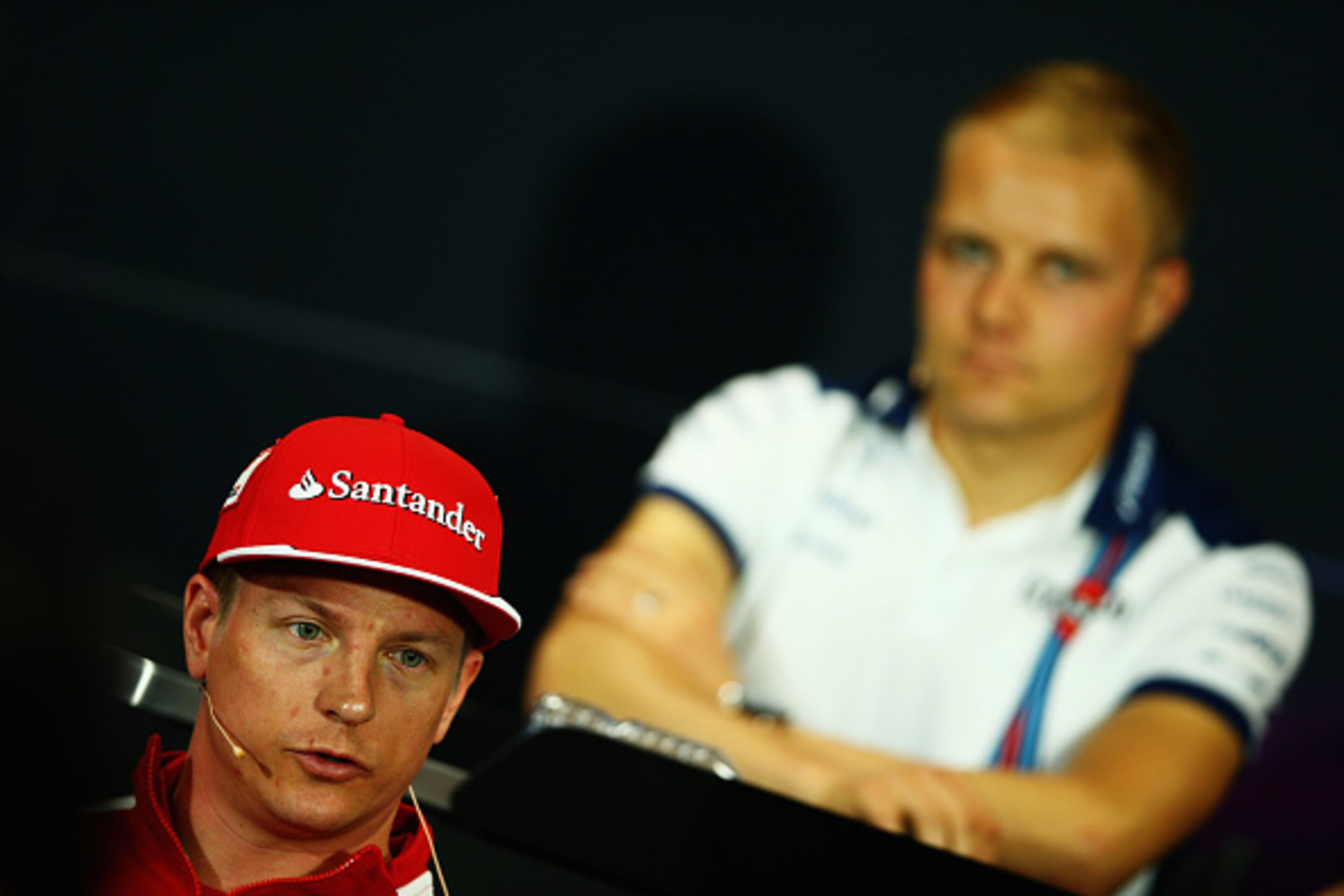 MONTE-CARLO, MONACO - MAY 20:  Valtteri Bottas of Finland and Williams (rear) and Kimi Raikkonen of Finland and Ferrari (front) attend the drivers press conference during previews to the Monaco Formula One Grand Prix at Circuit de Monaco on May 20, 2015 i
