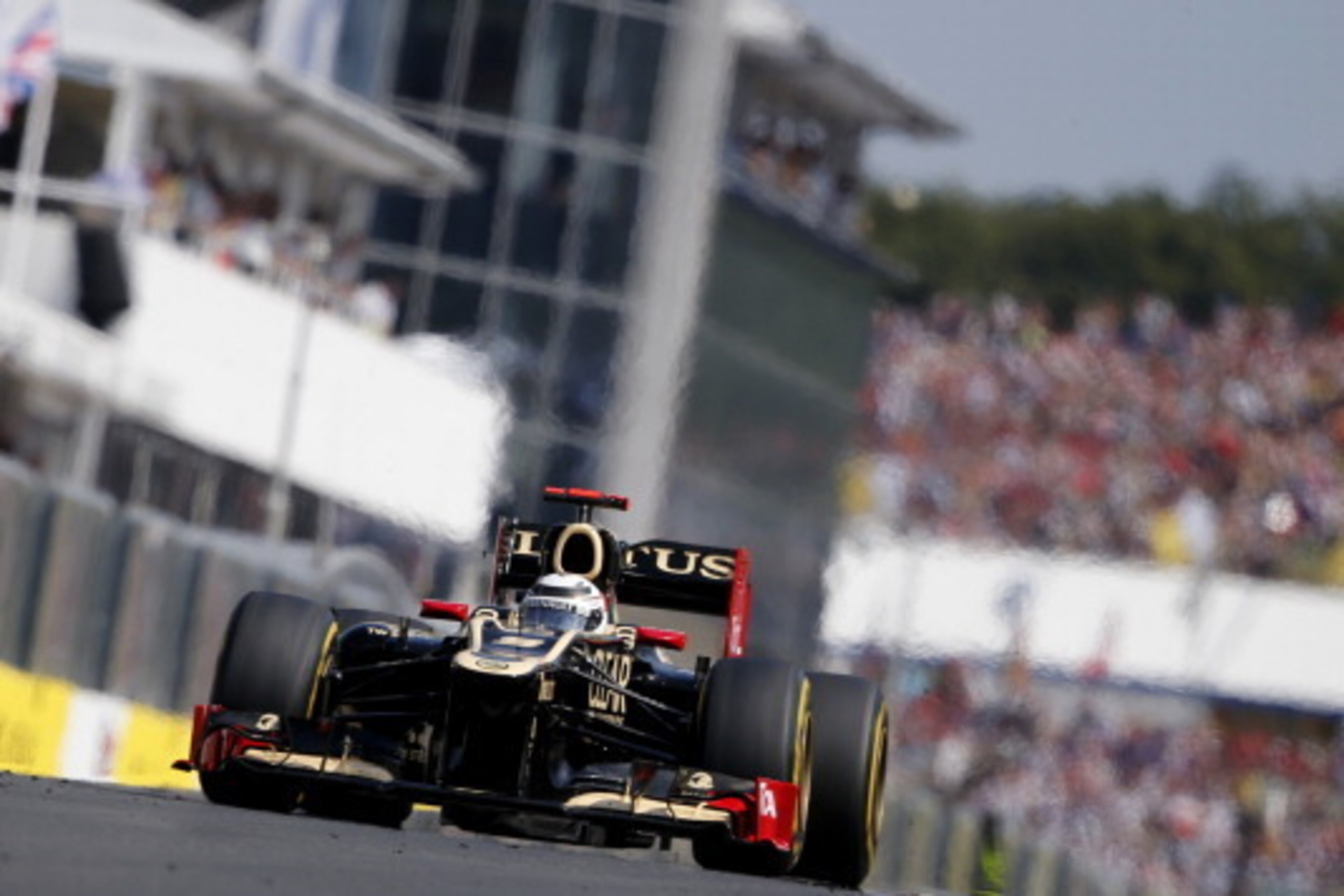 Lotus F1 Team's Finnish driver Kimi Raikkonen drives at the Hungaroring circuit on July 29, 2012 in Budapest during the Formula One Hungarian Grand Prix.      AFP PHOTO / PETER KOHALMI        (Photo credit should read PETER KOHALMI/AFP/GettyImages)