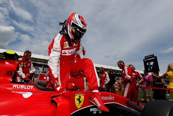 NORTHAMPTON, ENGLAND - JULY 05:  Kimi Raikkonen of Finland and Ferrari prepaes on the grid before the Formula One Grand Prix of Great Britain at Silverstone Circuit on July 5, 2015 in Northampton, England.  (Photo by Charles Coates/Getty Images)