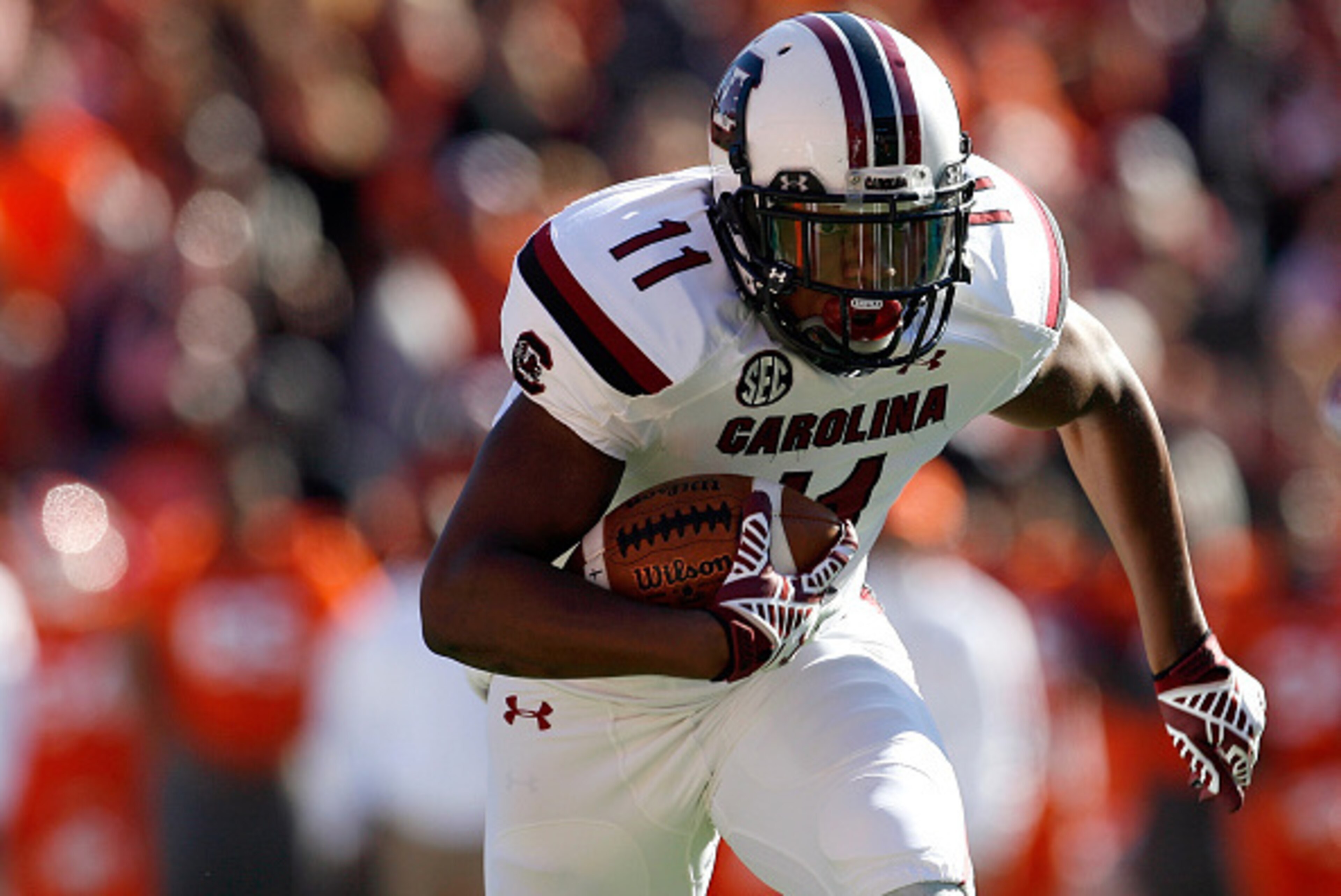 CLEMSON, SC - NOVEMBER 29: Pharoh Cooper #11 of the South Carolina Gamecocks rushes for a touchdown during their game against the Clemson Tigers at Memorial Stadium on November 29, 2014 in Clemson, South Carolina. (Photo by Tyler Smith/Getty Images) CLEMSON, SC - NOVEMBER 29: Pharoh Cooper #11 of the South Carolina Gamecocks rushes for a touchdown during their game against the Clemson Tigers at Memorial Stadium on November 29, 2014 in Clemson, South Carolina. (Photo by Tyler Smith/Getty Images)