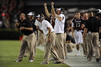 COLUMBIA, SC - SEPTEMBER 15: Coaches Shawn Elliott, Steve Spurrier, and G A Mangus call plays during the first half against the UAB Blazers in their NCAA college football game on September 15, 2012 at Williams Brice Stadium in Columbia, South Carolina. (P