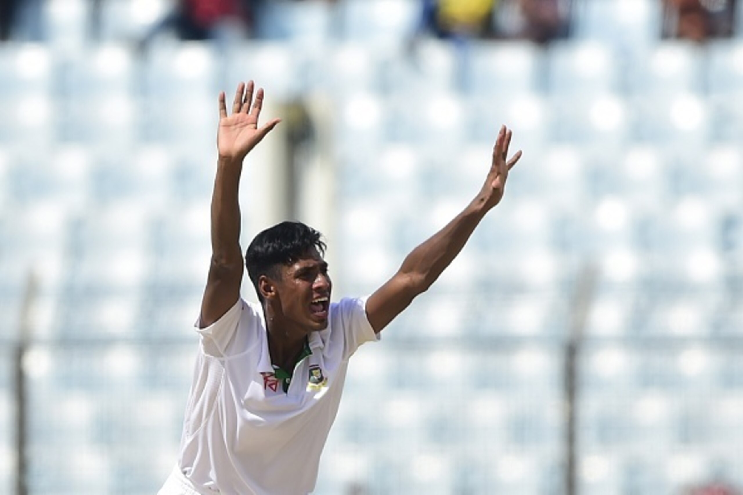 Bangladesh cricketer Mustafizur Rahman appeals successfully for leg before wicket decision against South Africa cricketer Jean-Paul Duminy during the first day of the first Test match between Bangladesh and South Africa at the Zahur Ahmed Chowdhury Stadiu